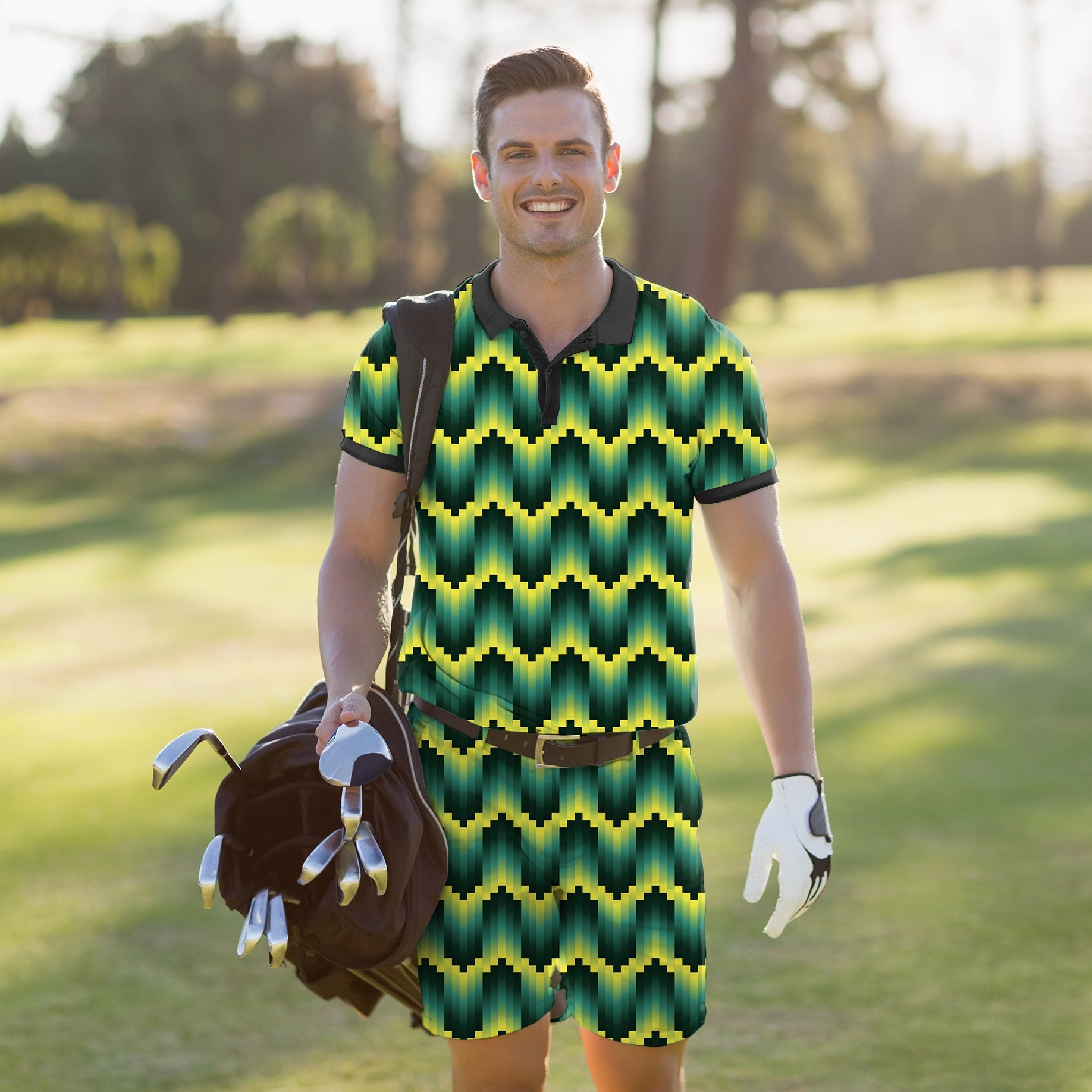 Man wearing green ripples patterned men's golf set polo and shorts carrying golf bag on course