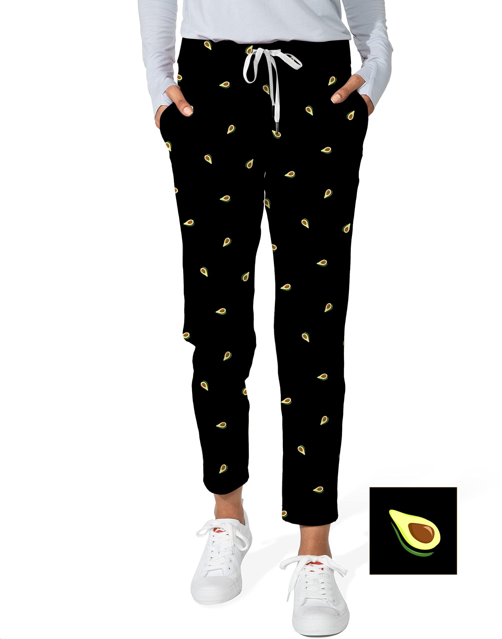 Women's 7/8 stretch ankle golf pants with avocado custom print and black background