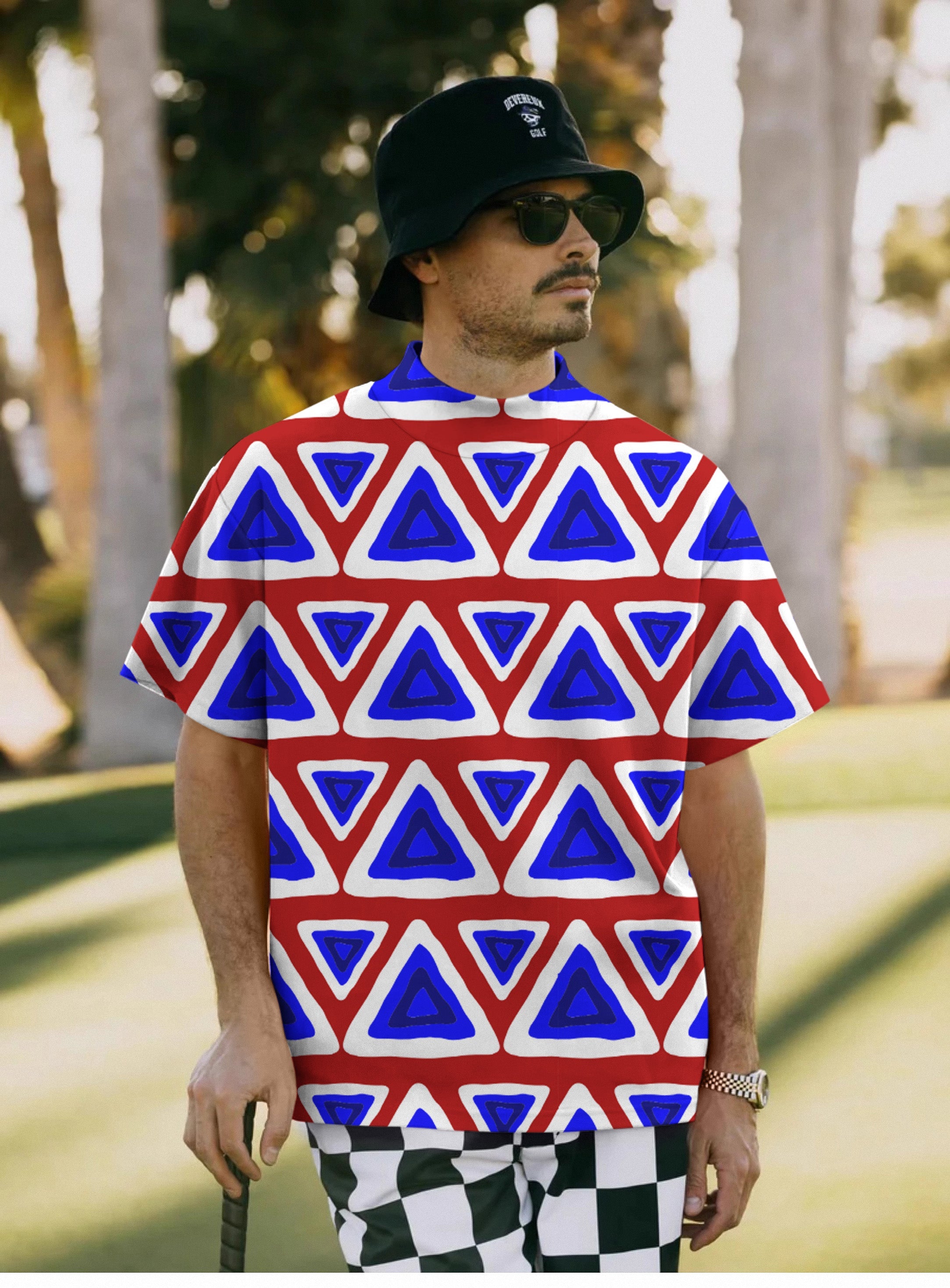 Men's Triangle tribal pullover t-shirt with blue and red geometric pattern on model outdoors