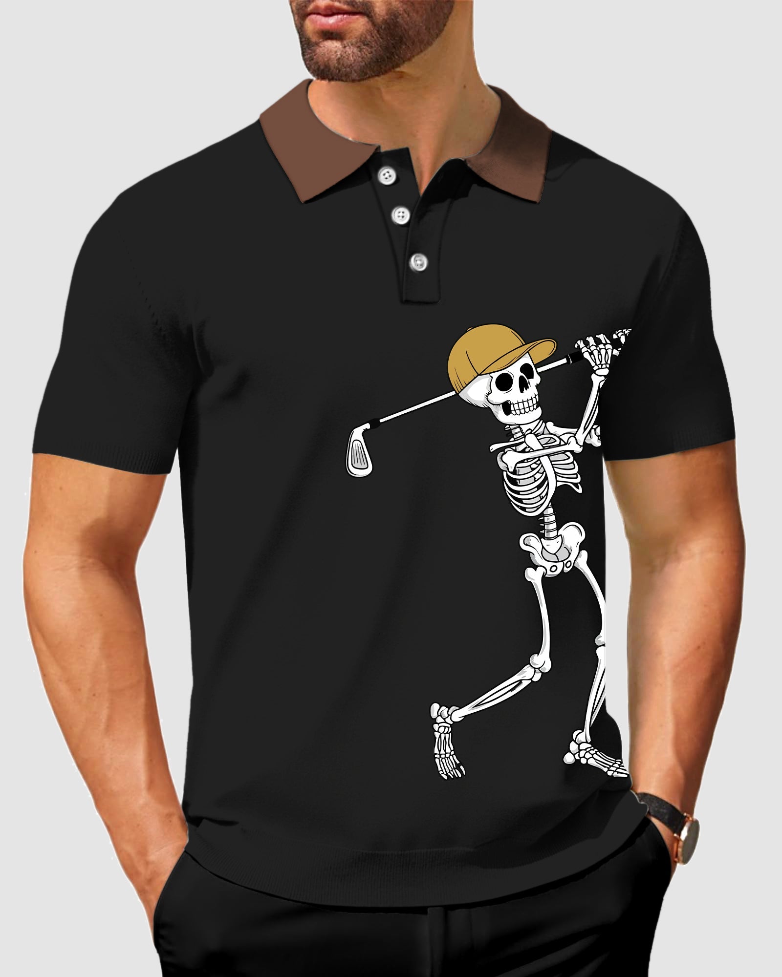 Men's black golf polo with brown collar and Halloween skeleton golf player design