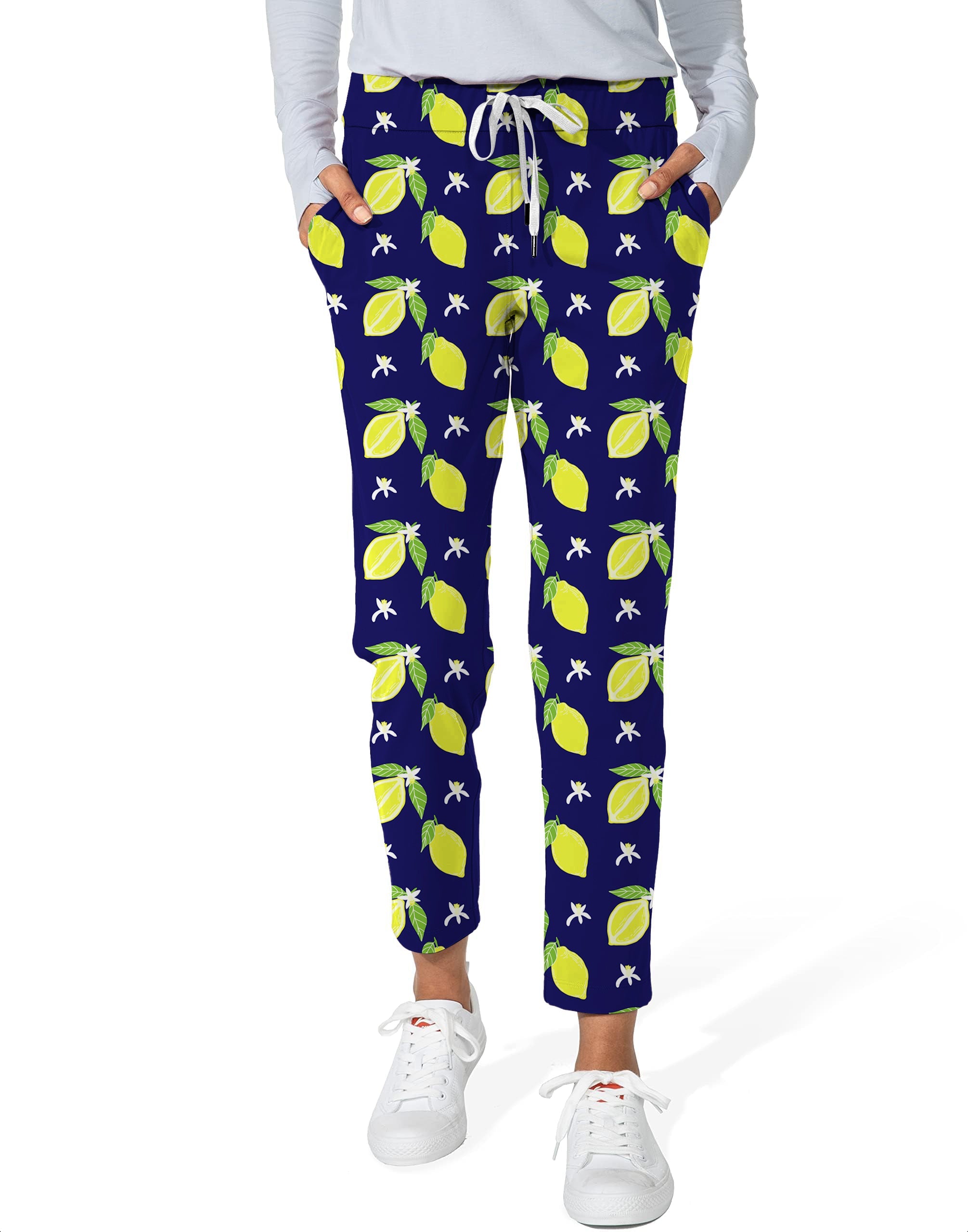Women's 7/8 stretch ankle golf pants with zesty lemon print on navy background
