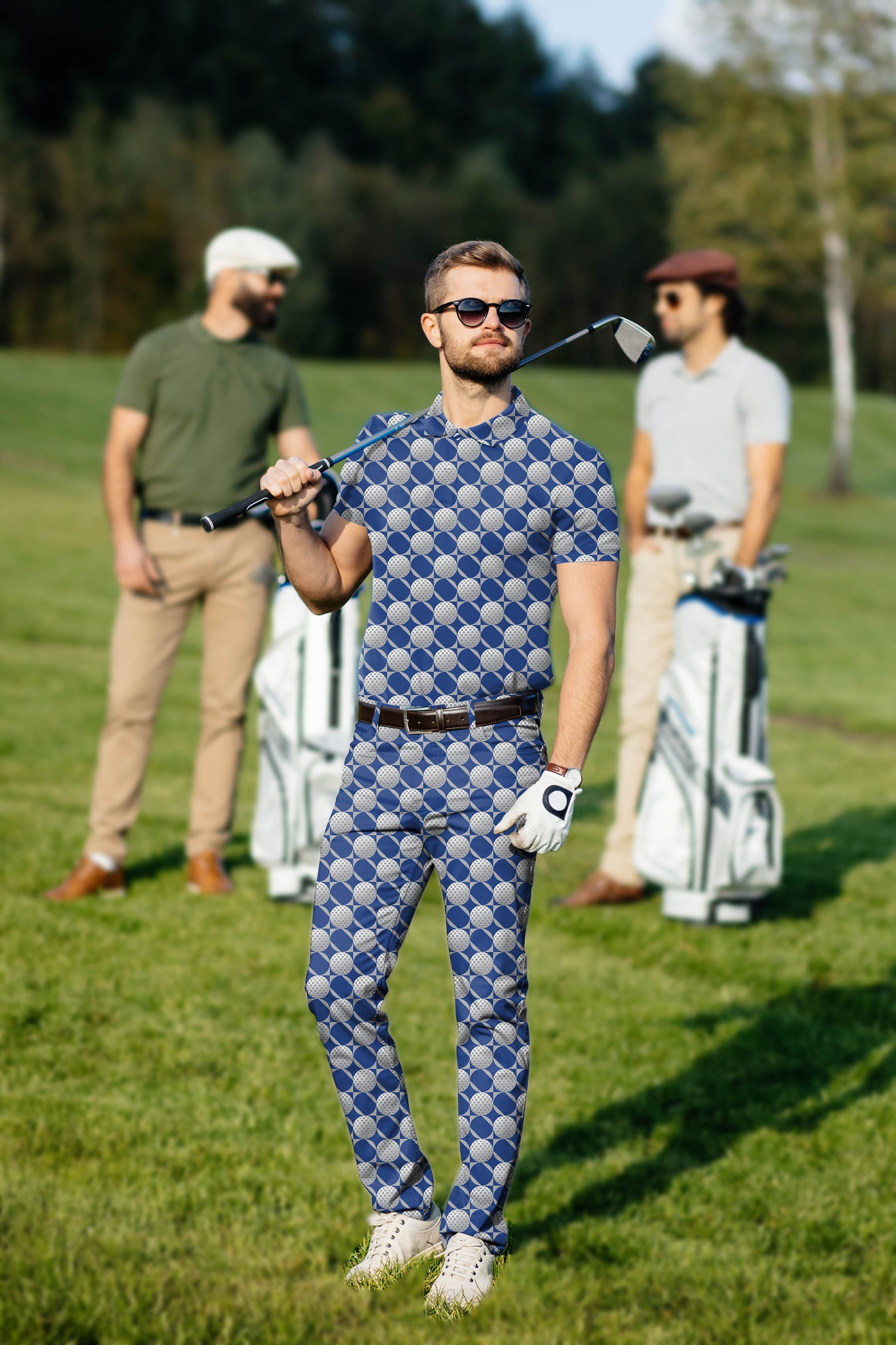 Men's Golf Set blue patterned polo and pants on golfer holding club on course