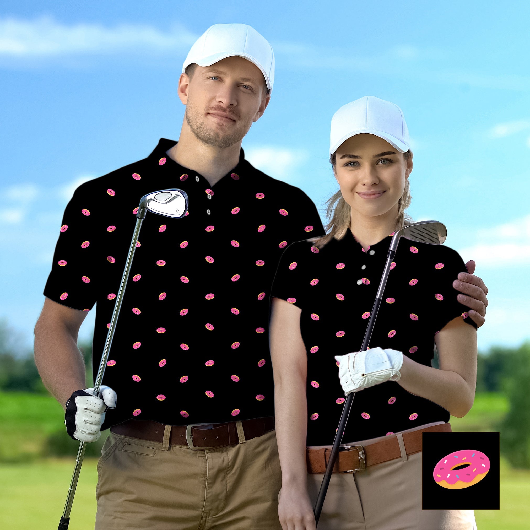 Couple wearing custom black golf shirts with pink donut pattern and white caps holding golf clubs on golf course