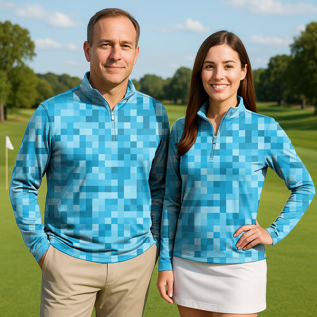 Blue Pixel Big Couple Golf active 3/4 zip tops with pixel pattern, long sleeves, and mock collars on a golf course