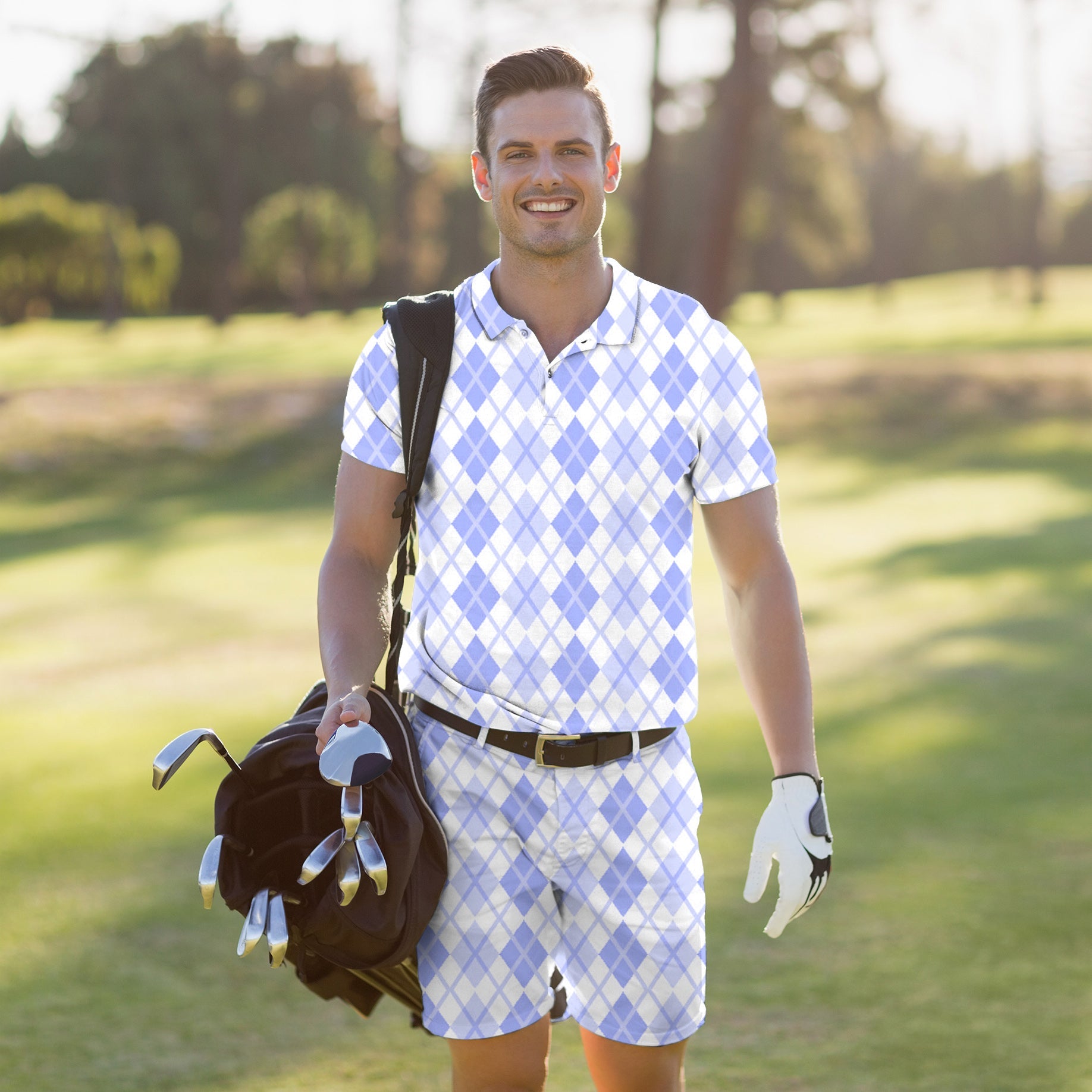 Men's golf set polo and shorts with purple argyle grid pattern on a golfer carrying clubs outdoors