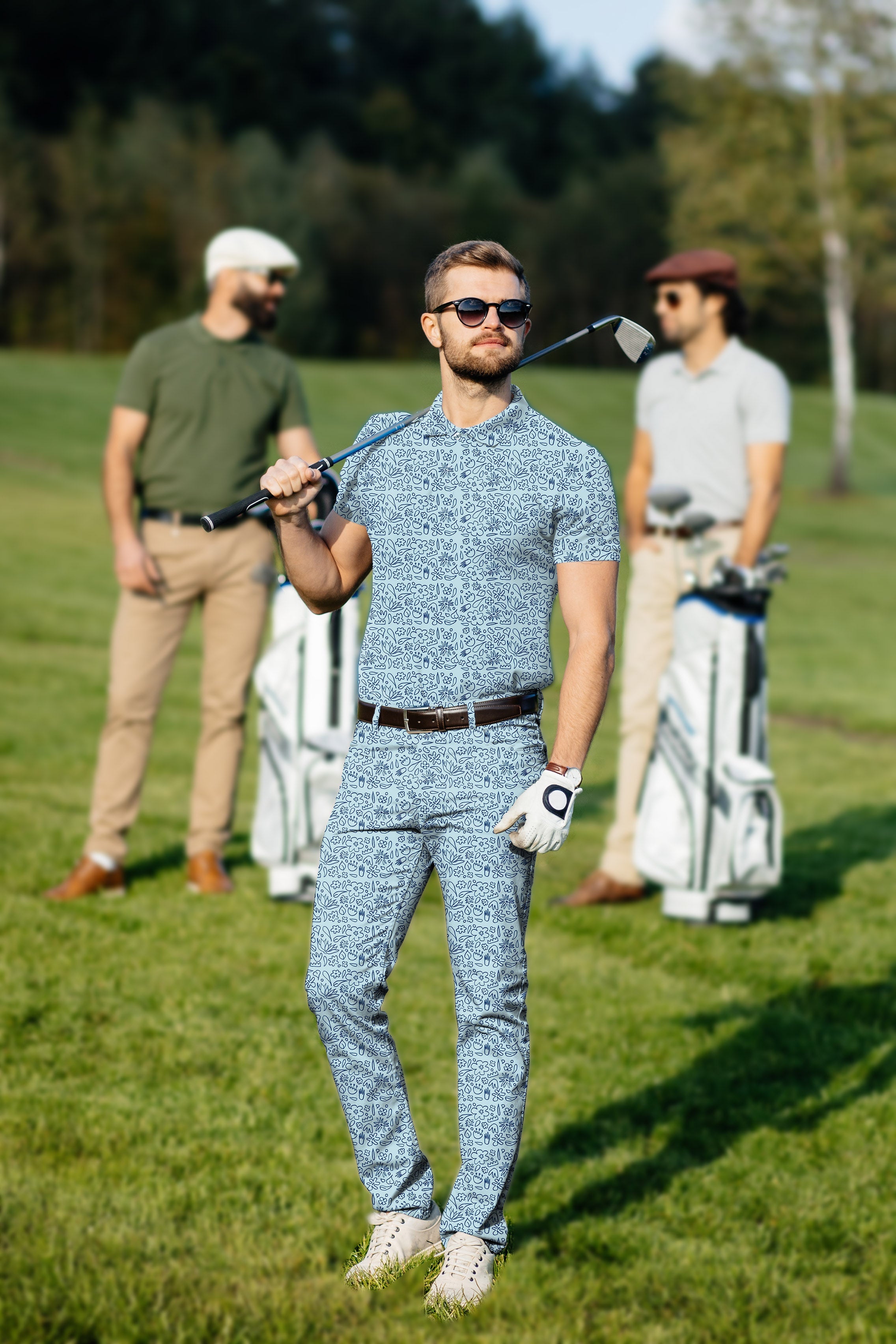 Men's golf set with blue flower print polo and pants, four-way stretch, moisture-wicking, UPF 40+ protection, wrinkle-resistant fabric, classic fit.