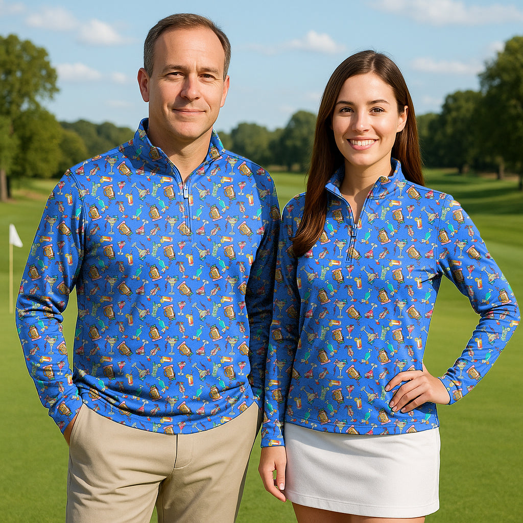Couple wearing Summer Fruit Juice active 3/4 zip golf tops with long sleeves on a sunny golf course