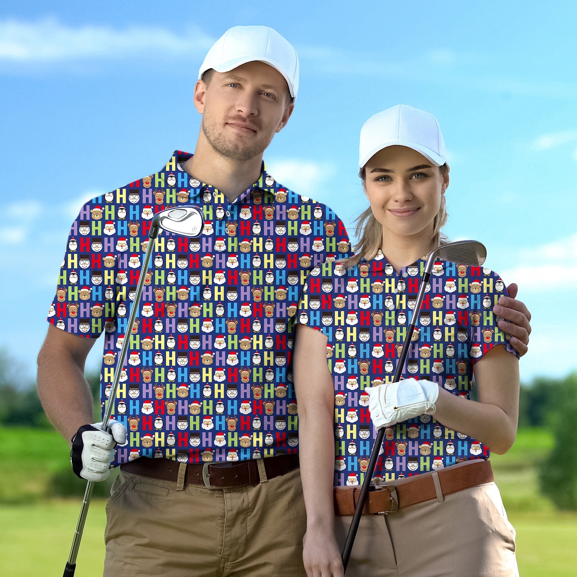 Couple wearing matching Cartoon H Elk Christmas golf shirts holding clubs on a golf course