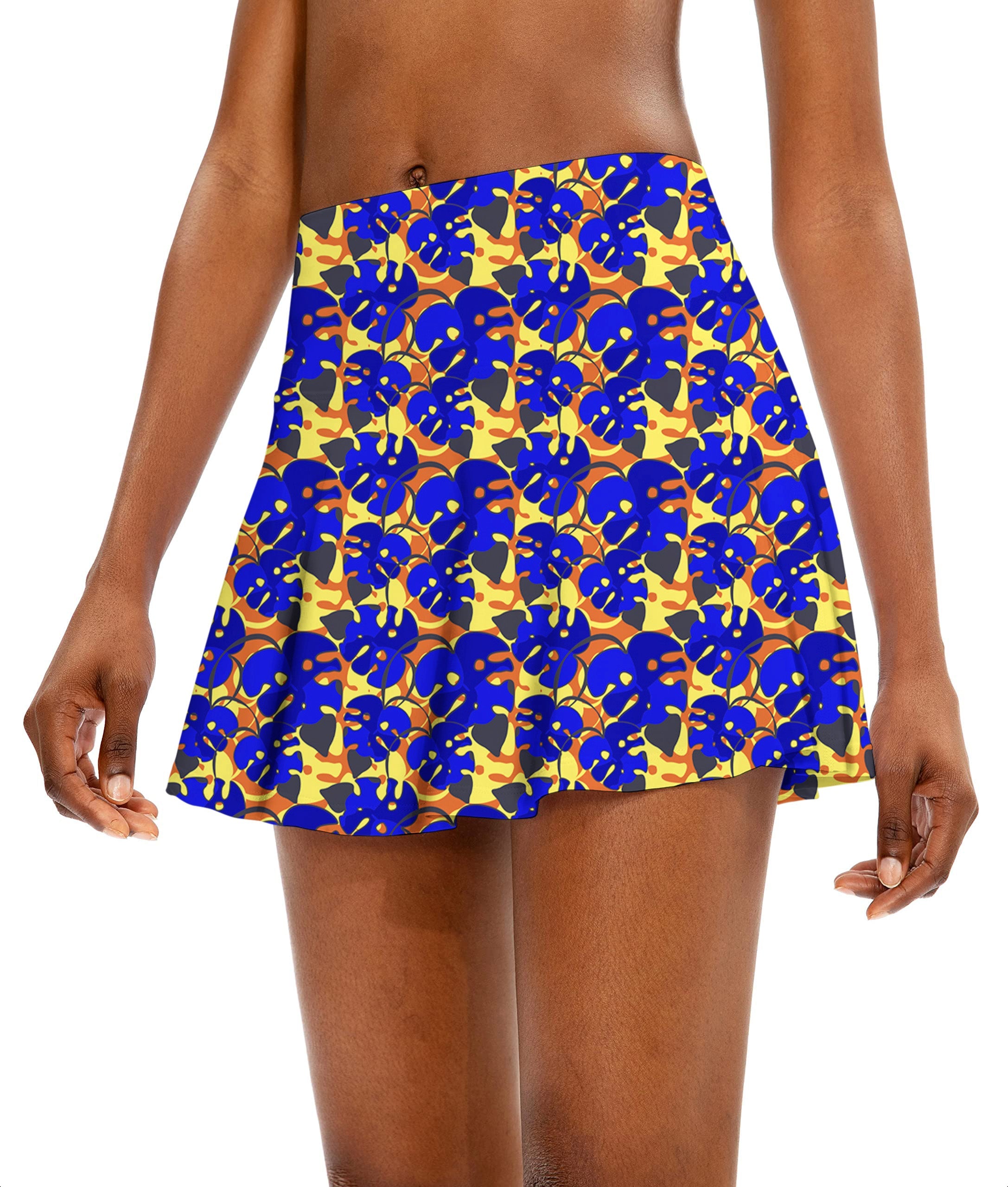 women's athletic golf skorts with blue and yellow tropical leaves pattern flared skirt