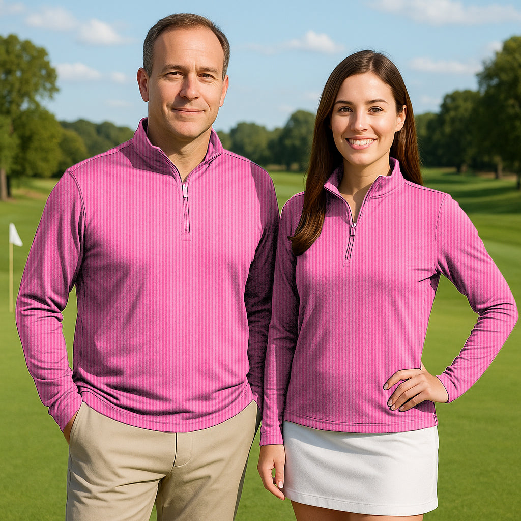 Couple wearing pink stripe 3/4 zip golf active tops with long sleeves on golf course