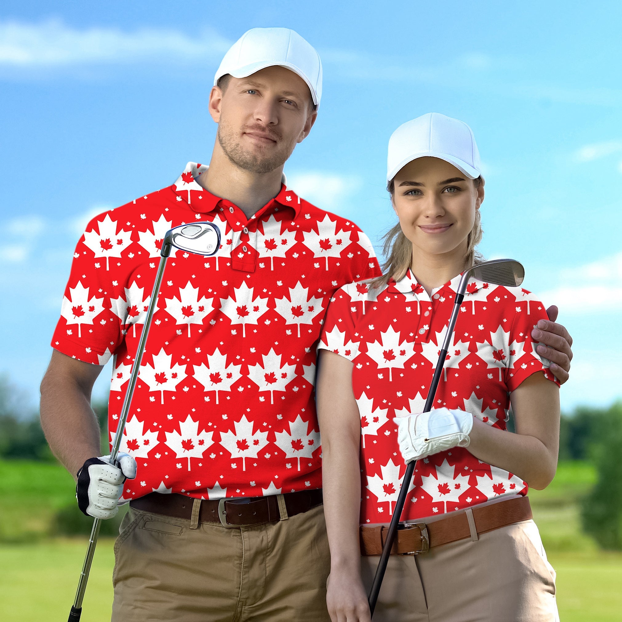 Couple wearing matching Canadian Maple Leaf golf shirts with white caps standing on golf course holding clubs