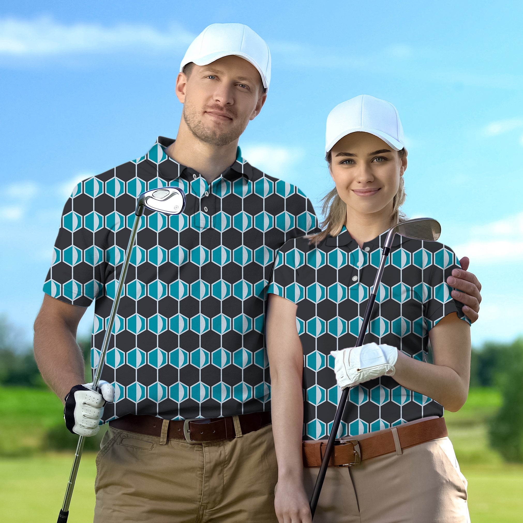 Couple wearing navy blue hexagon pattern golf polo shirts with white caps on golf course, holding clubs, limited edition family set