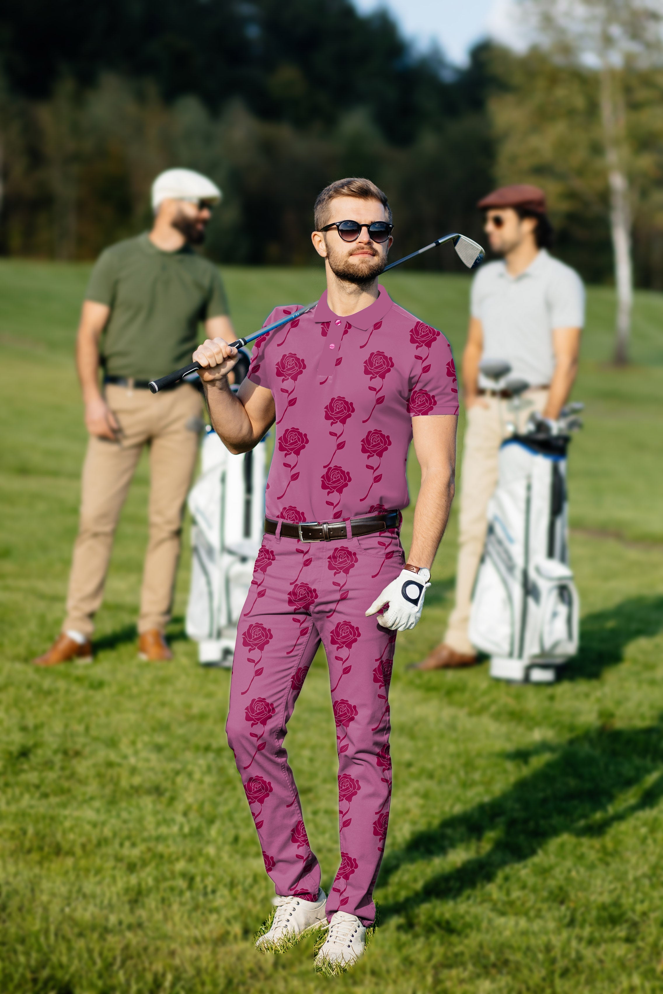 Men's golf set with red rose patterned polo and pants, four-way stretch, moisture-wicking, UPF 40+ protection, and classic fit on golf course.