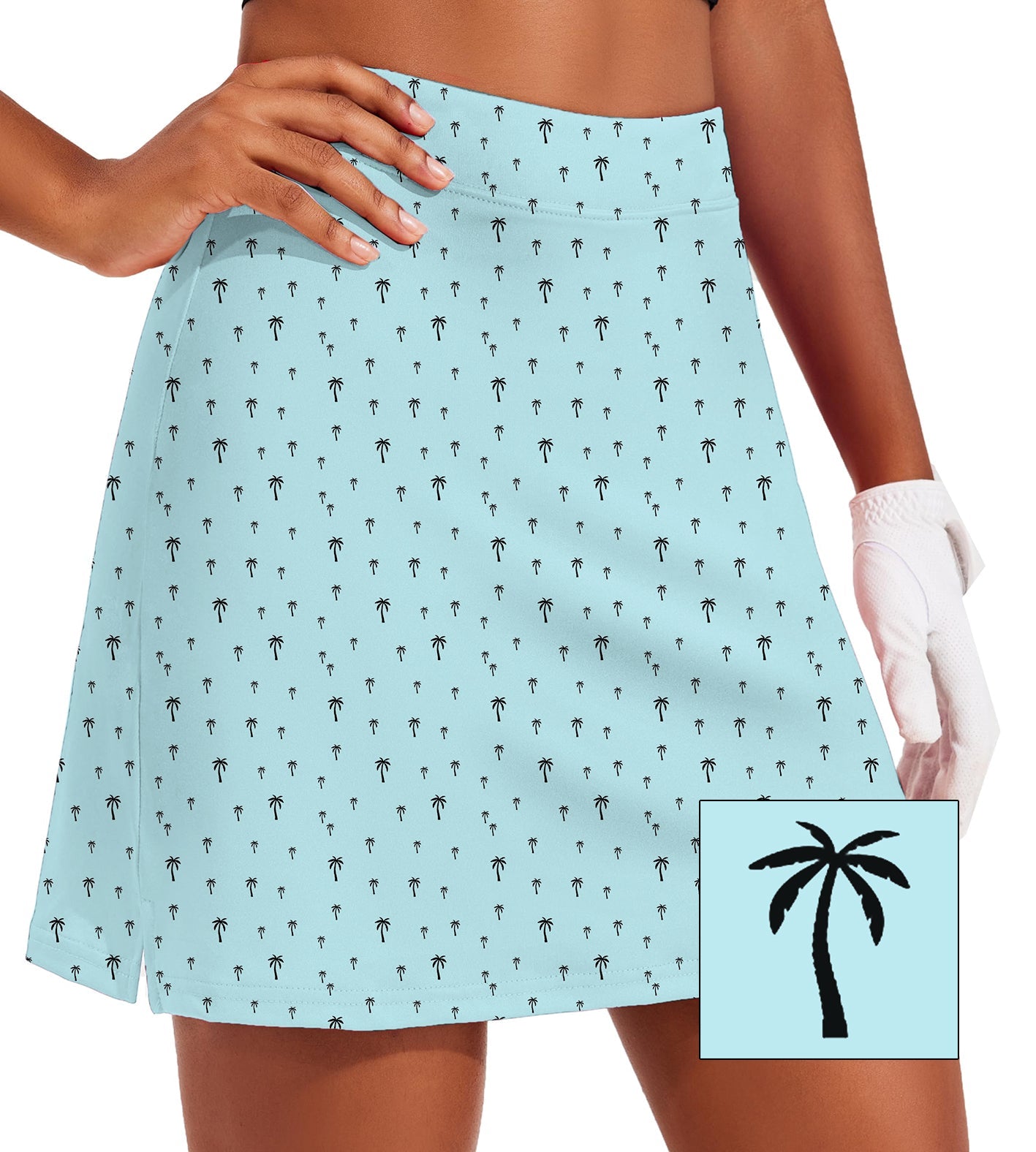 Women's light blue golf skirt with palm tree pattern and inner shorts pocket