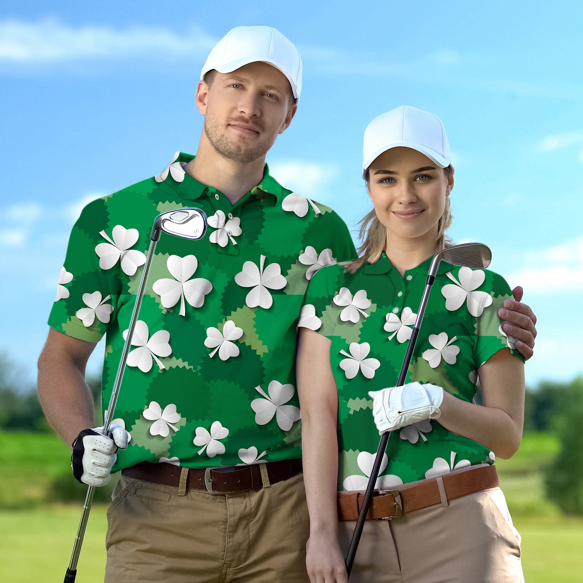 Couple wearing matching green leaf clover golf shirts holding clubs on golf course