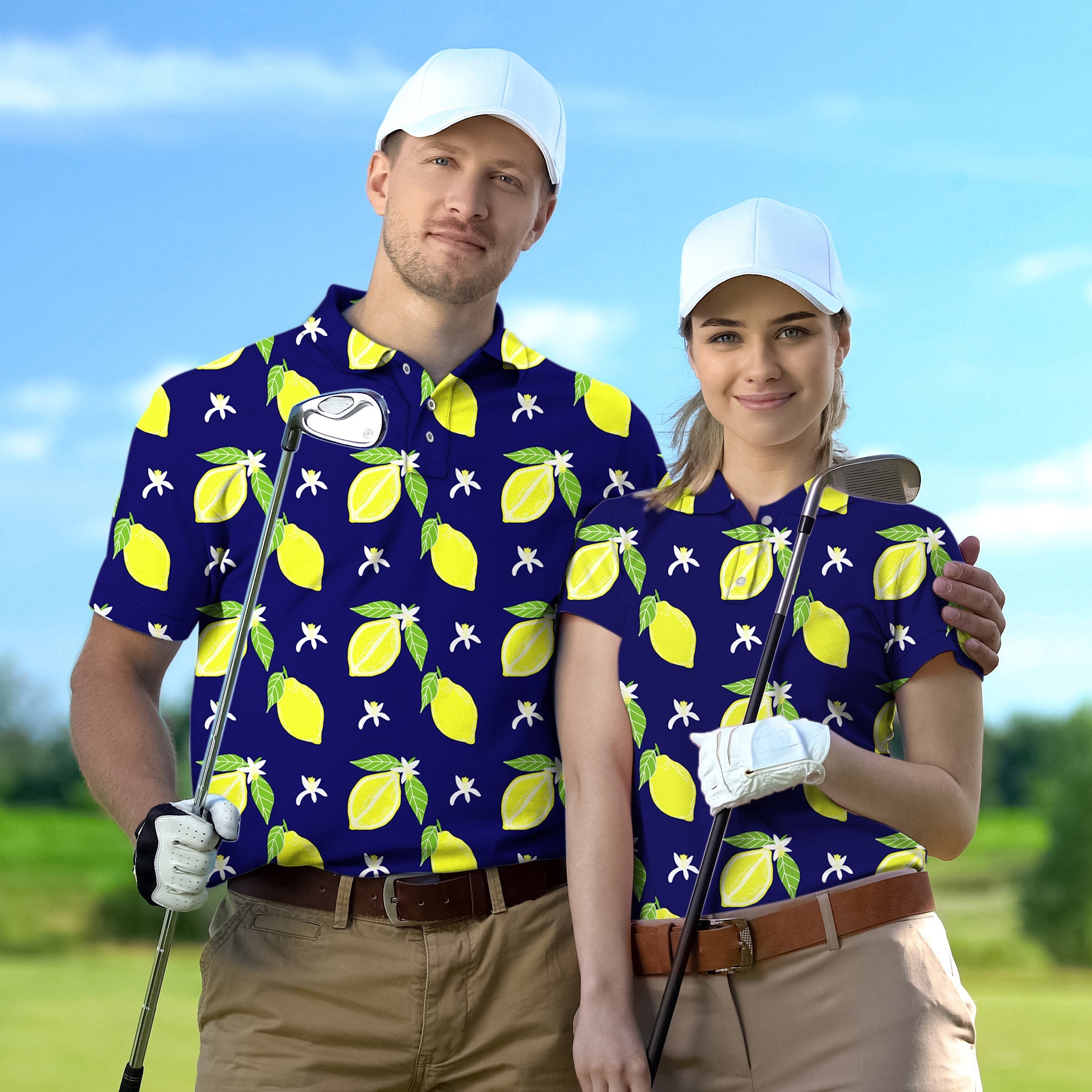 Couple wearing Zesty lemon set golf shirts with lemon print and white caps on golf course