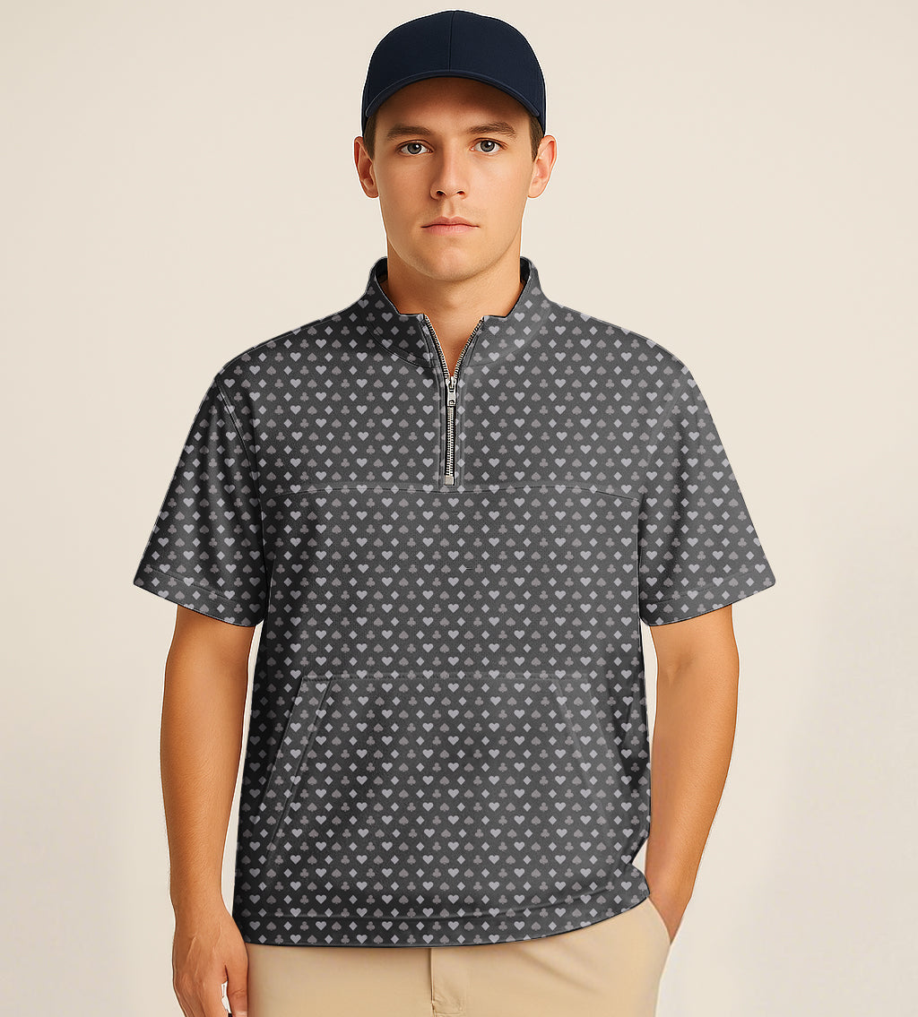 Man wearing half zipper turtleneck short sleeve golf shirt with poker pattern quilting and embroidery.