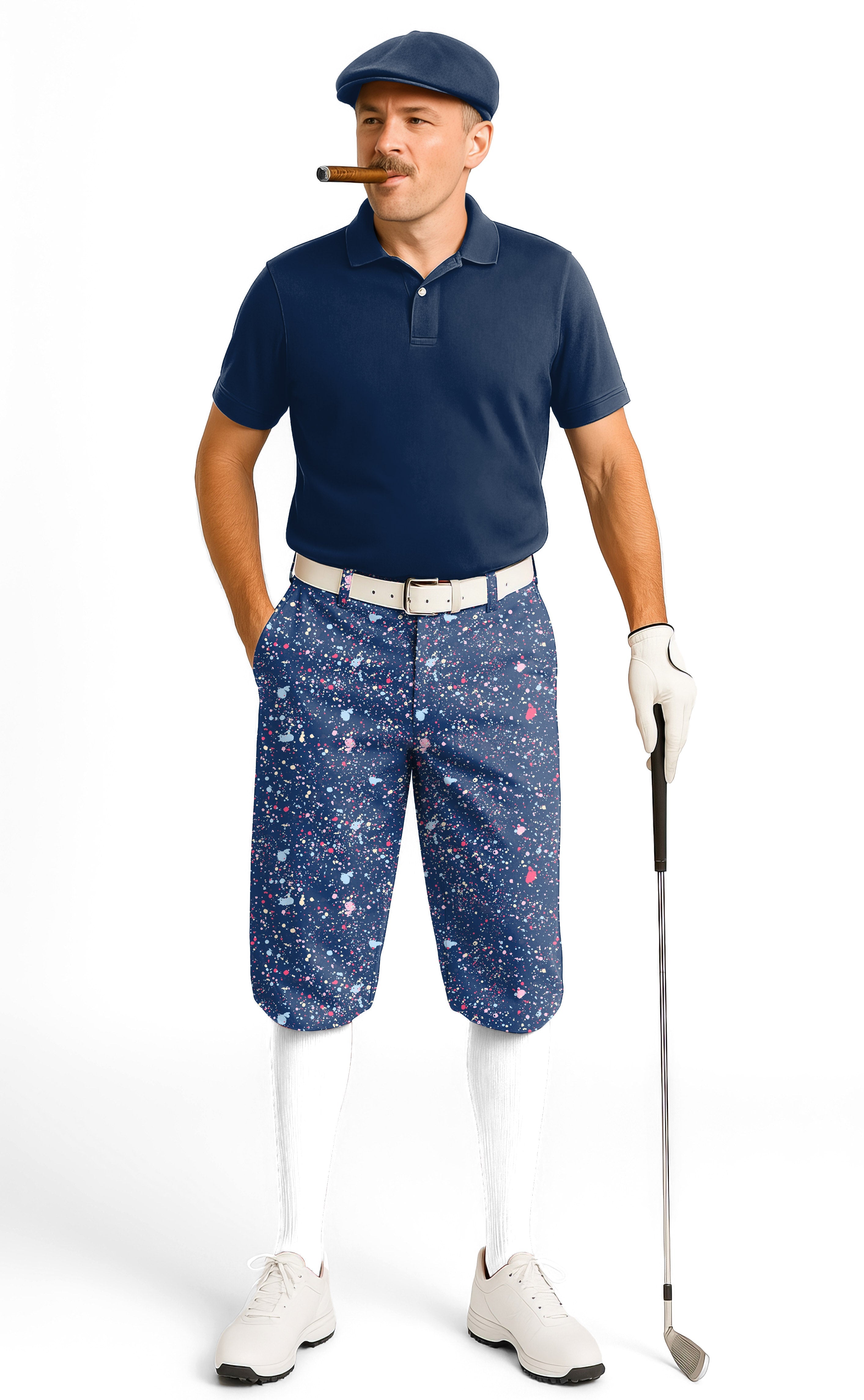 Man wearing navy blue ink dots men's golf knickers with snug ankle cuffs and breathable fabric playing golf