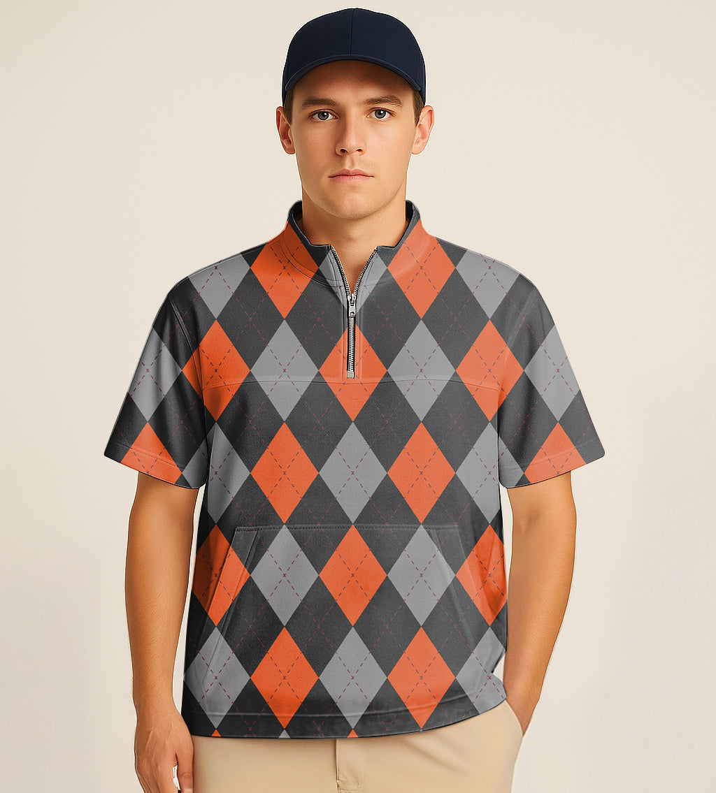 Male model wearing half zipper turtleneck golf shirt with black, red, and gray argyle pattern