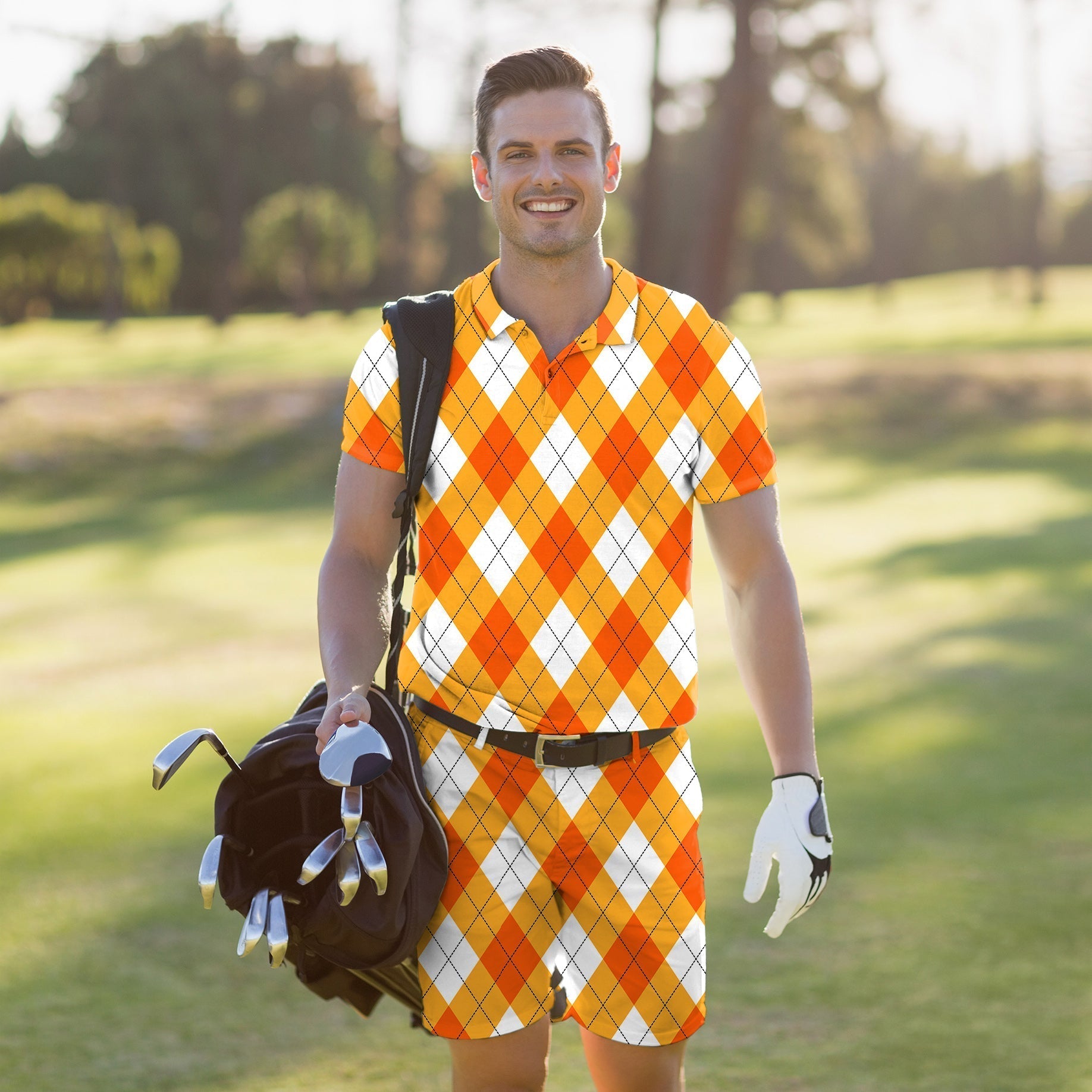 Men's golf set with orange and white argyle polo and shorts suitable for Halloween, featuring four-way stretch and moisture-wicking fabric