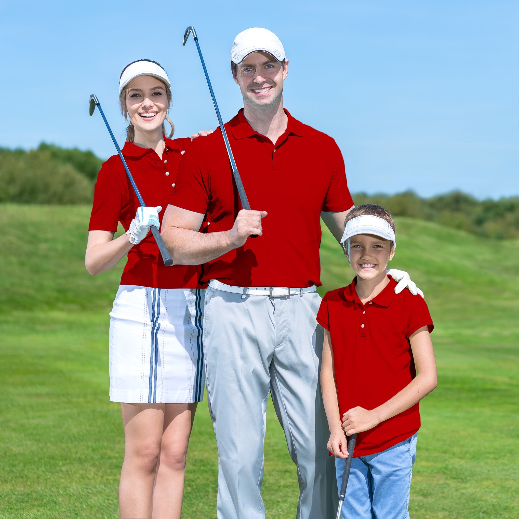 Family wearing pure festive set red golf shirts on golf course holding clubs