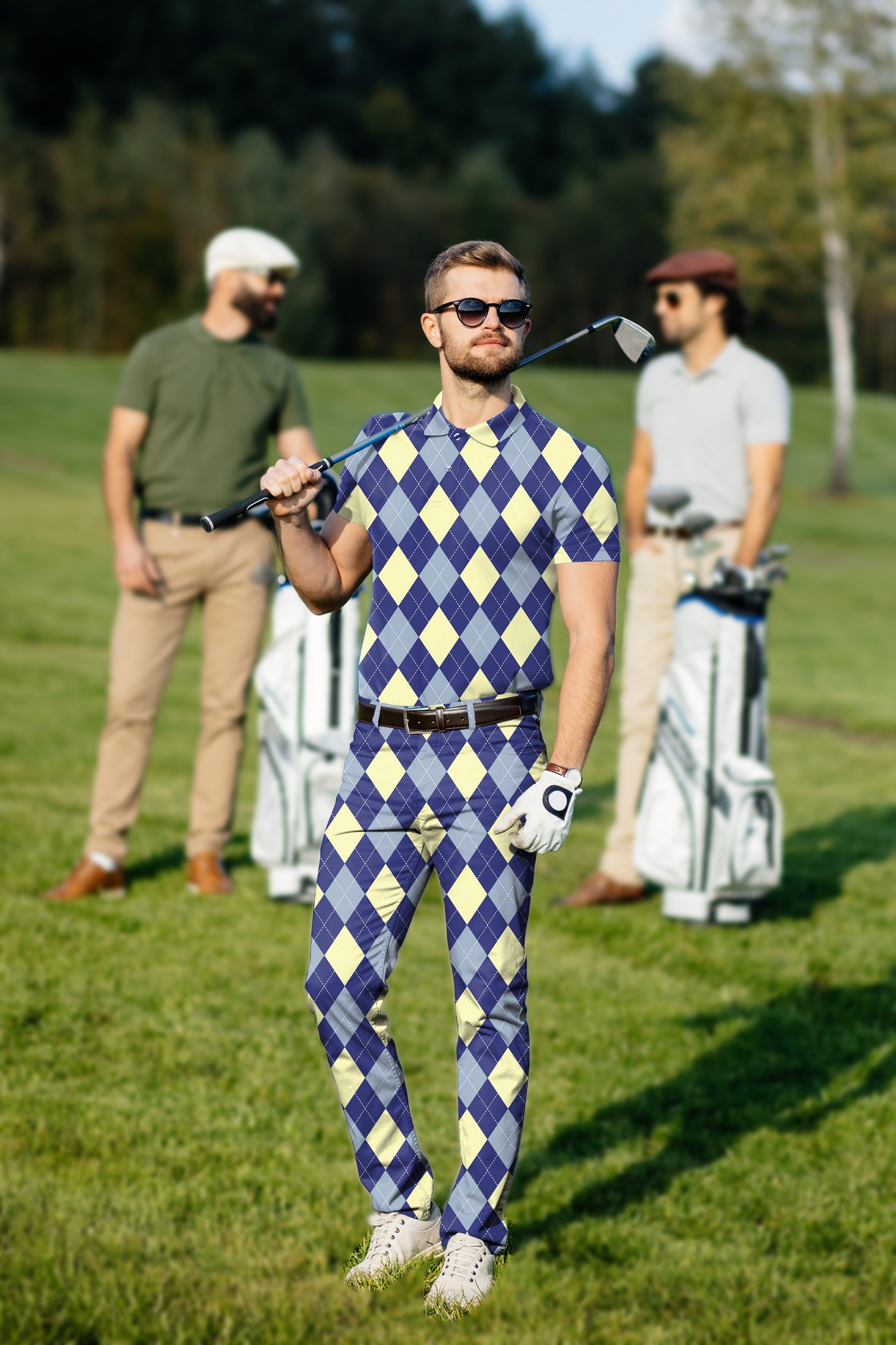 Men's golf set featuring blue argyle polo and pants with four-way stretch and moisture-wicking fabric