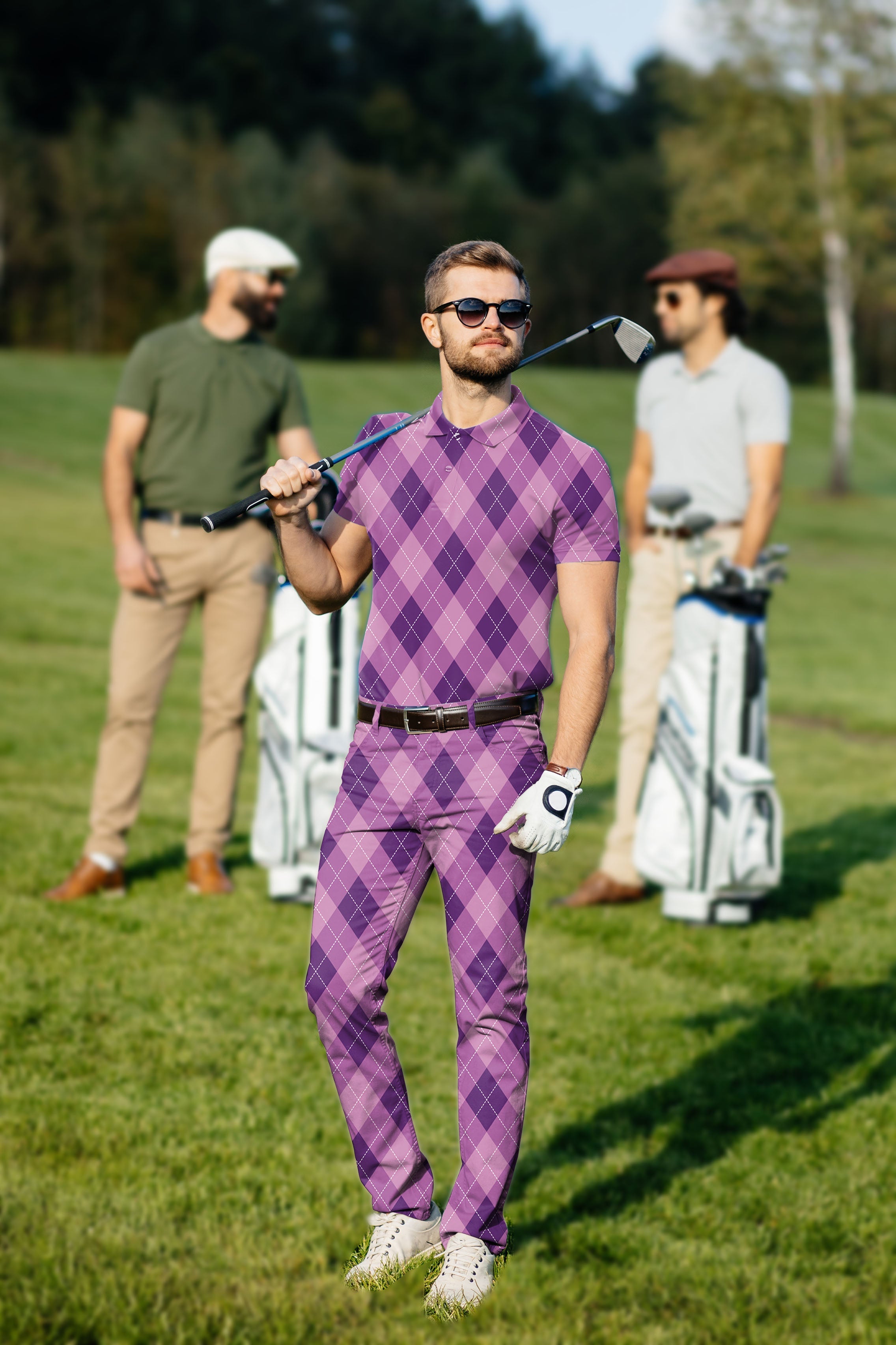 Men's golf set with purple argyle polo and pants in classic fit on golf course