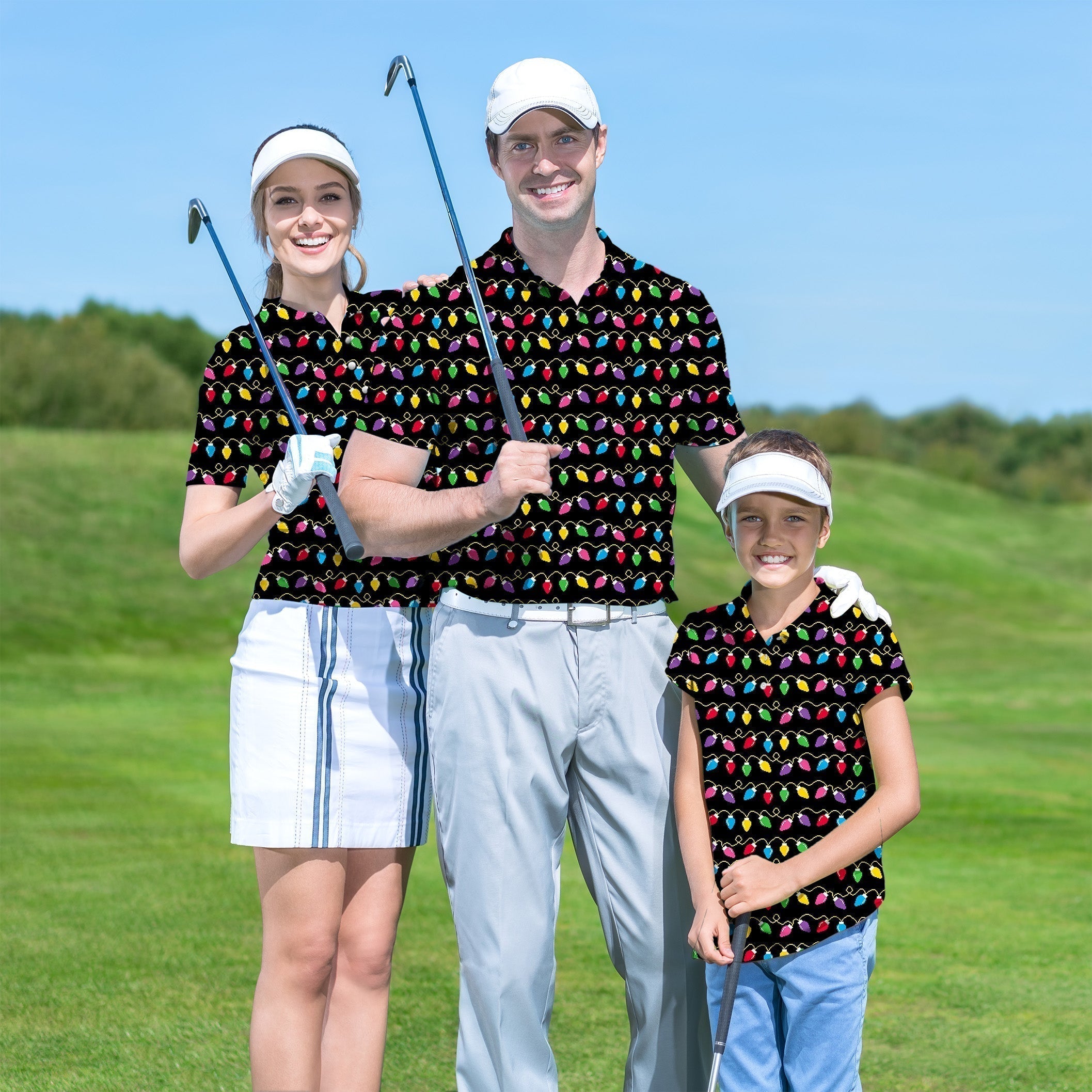 Family wearing matching Christmas lights print golf shirts on golf course