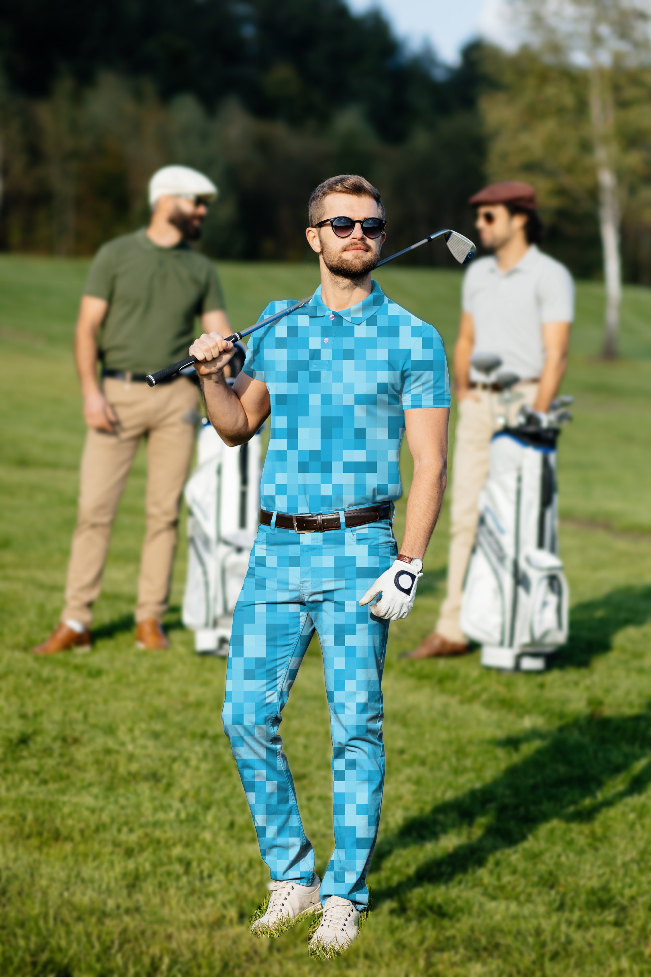 Men's blue pixel pattern golf set polo and pants on golfer with club on course
