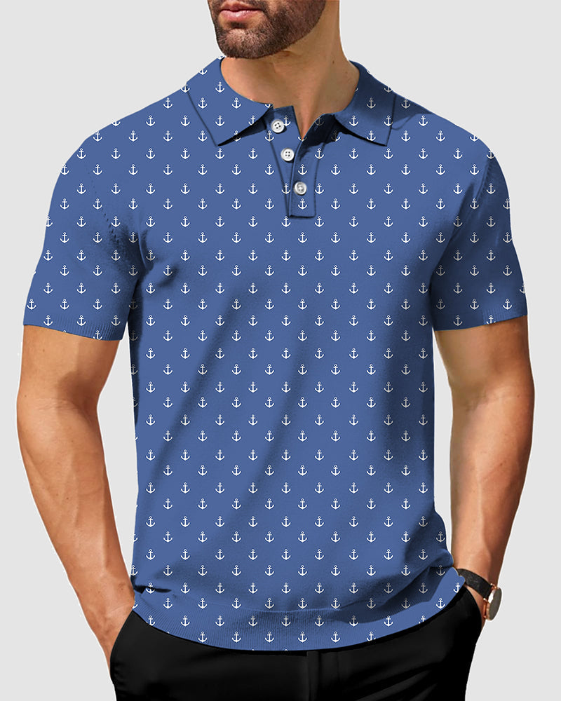 Men's navy polo shirt with white anchor pattern, classic fit, moisture-wicking fabric, and wrinkle-resistant finish