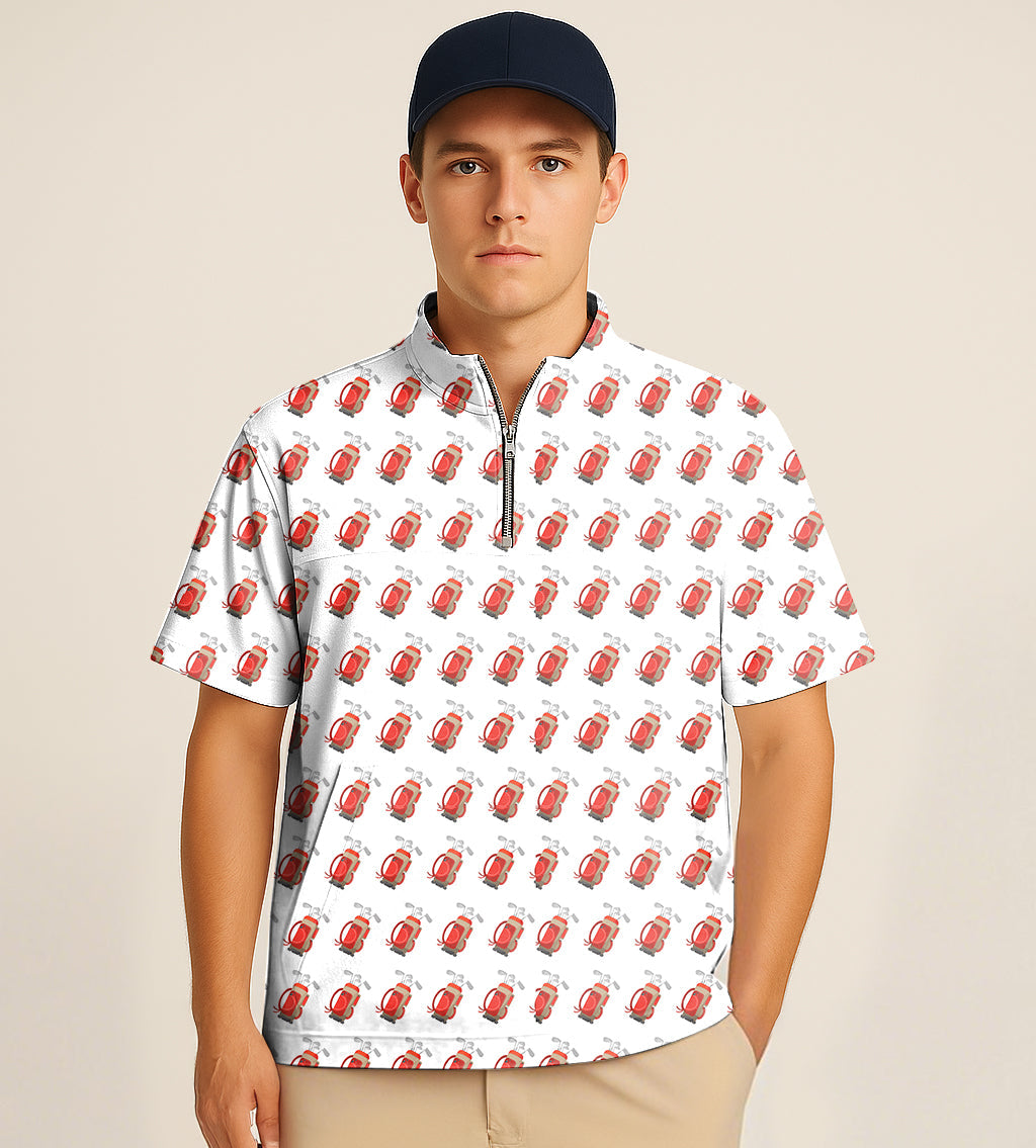 Man wearing half zipper turtleneck short sleeve golf shirt with red and black bag embroidery pattern and navy cap