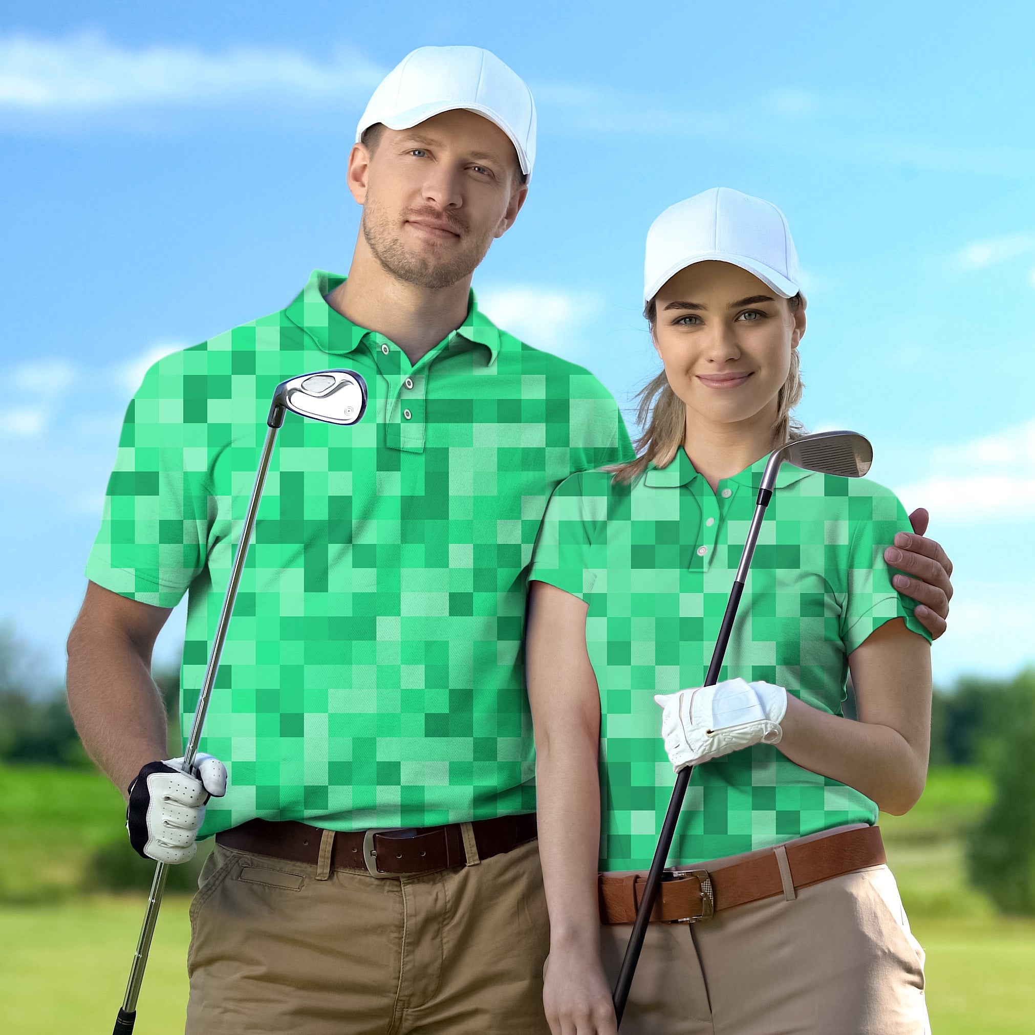 Couple wearing green pixel pattern golf shirts holding golf clubs on golf course