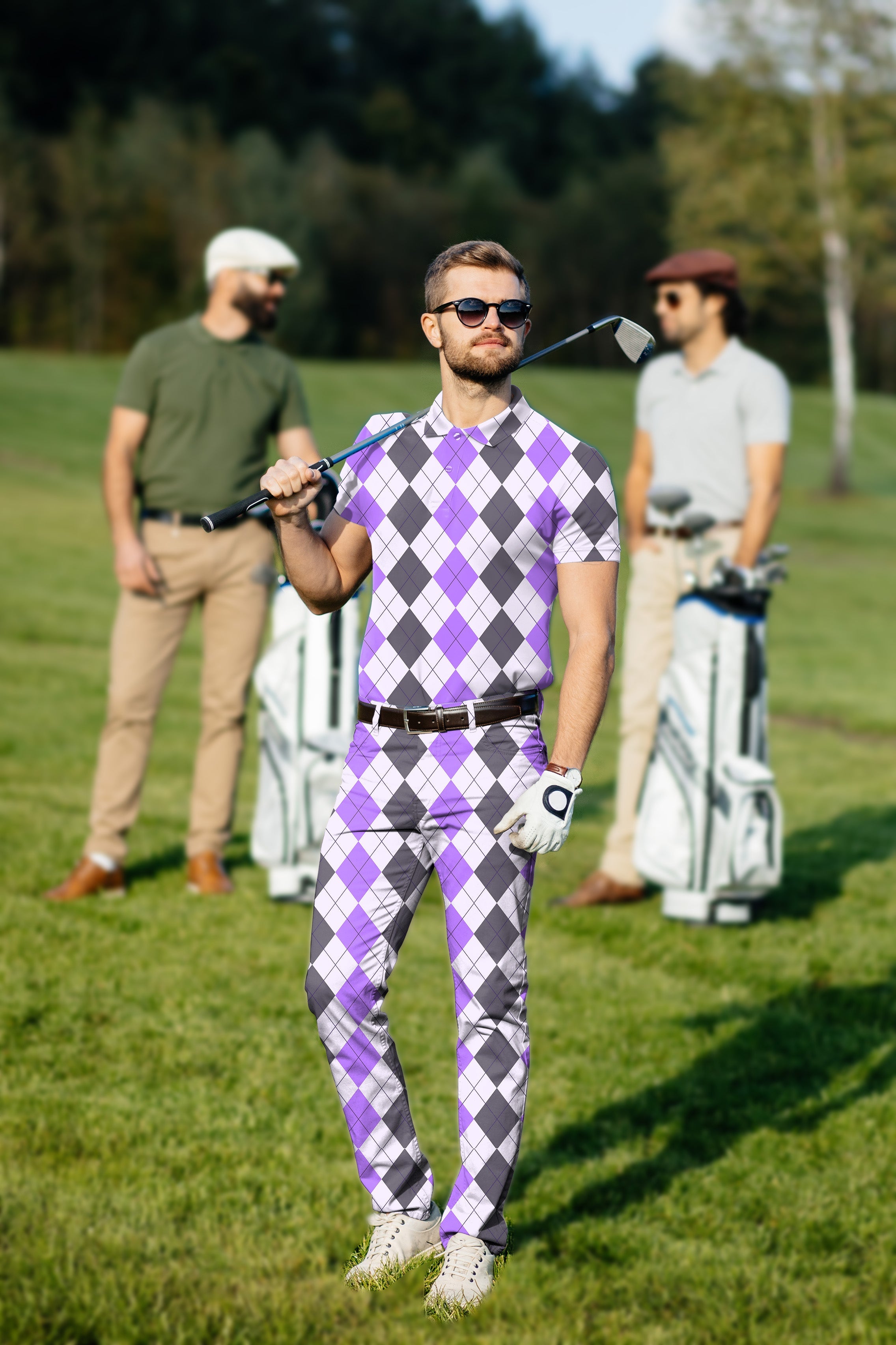 Men's golf set with purple grey argyle polo and pants on golf course