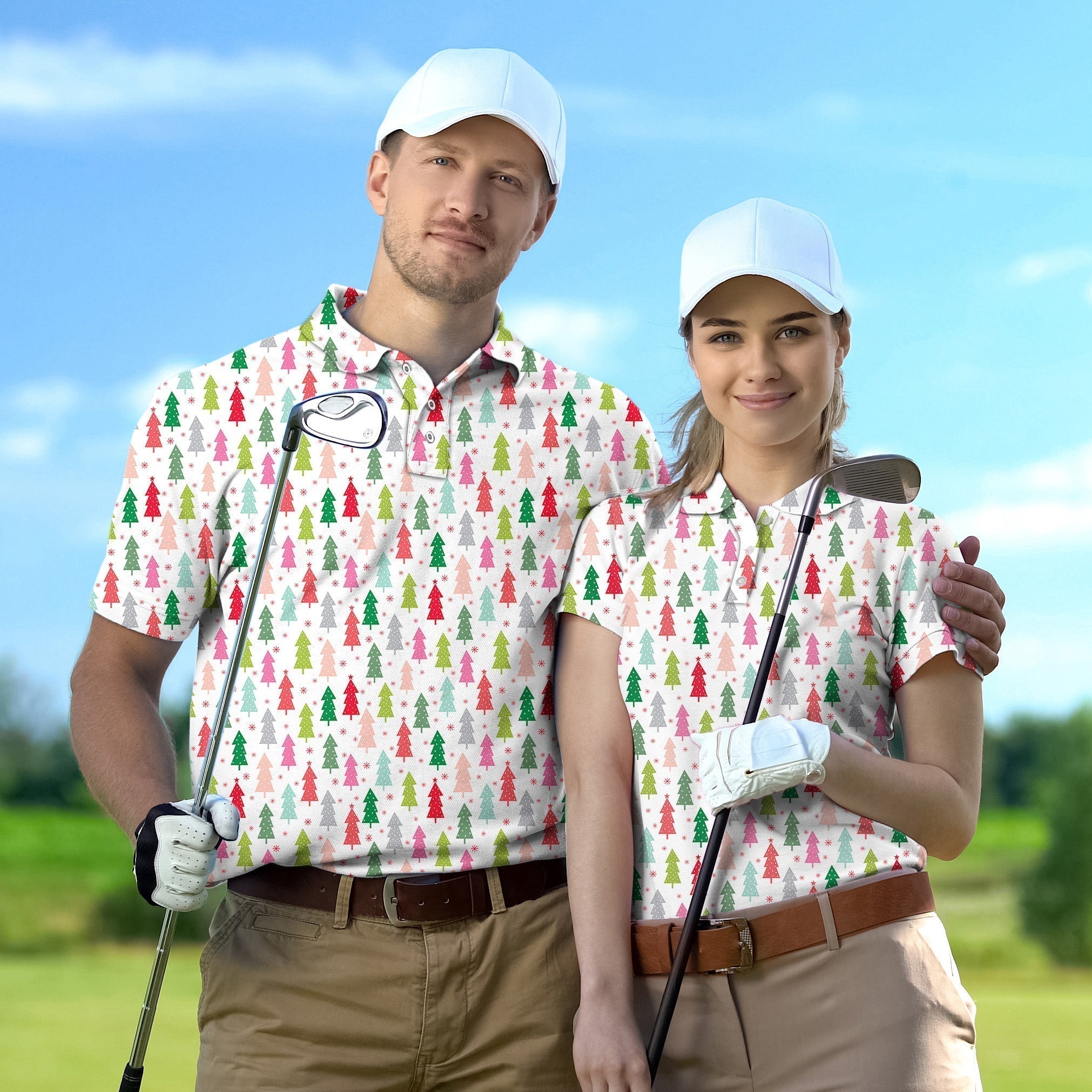 Couple wearing colorful Christmas tree patterned golf shirts holding clubs on golf course