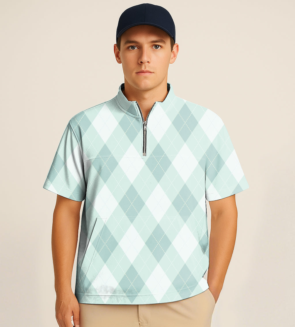 Man wearing green argyle half zipper turtleneck golf short shirt and navy cap