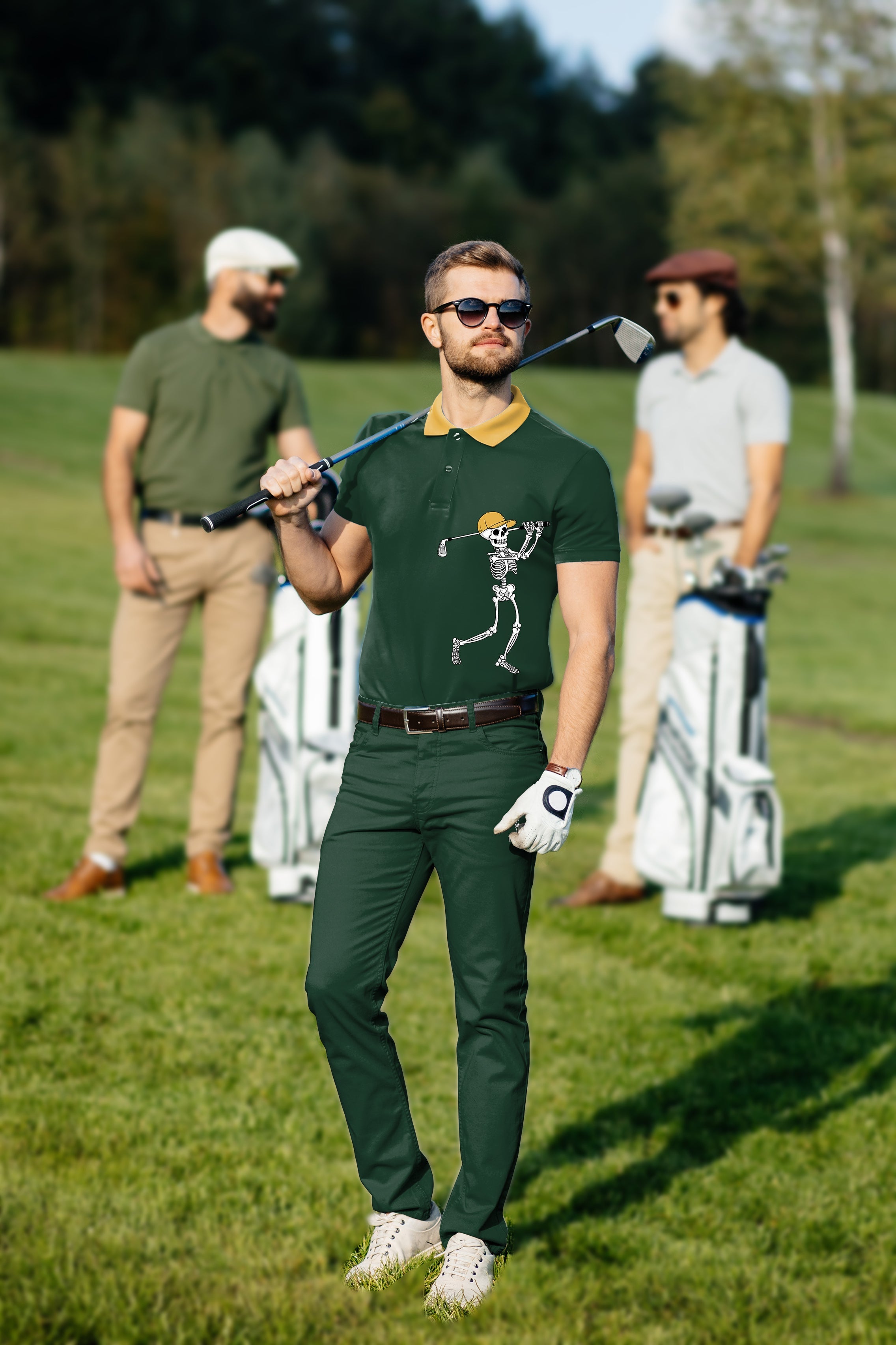Men's golf set with yellow green Halloween skeleton polo and pants on golfer on course
