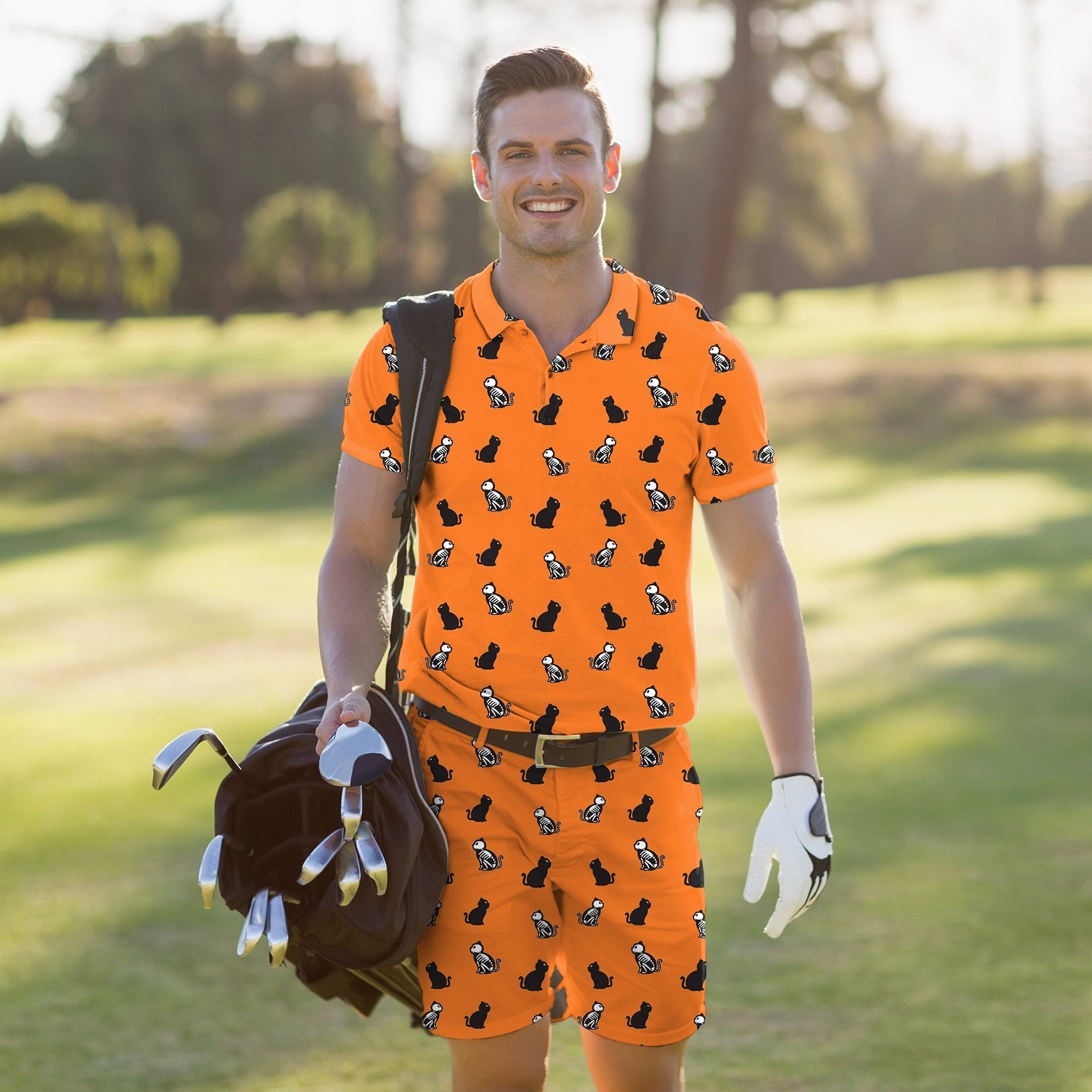 Men's golf set with Halloween skull cat design, orange polo and shorts, moisture-wicking and four-way stretch fabric