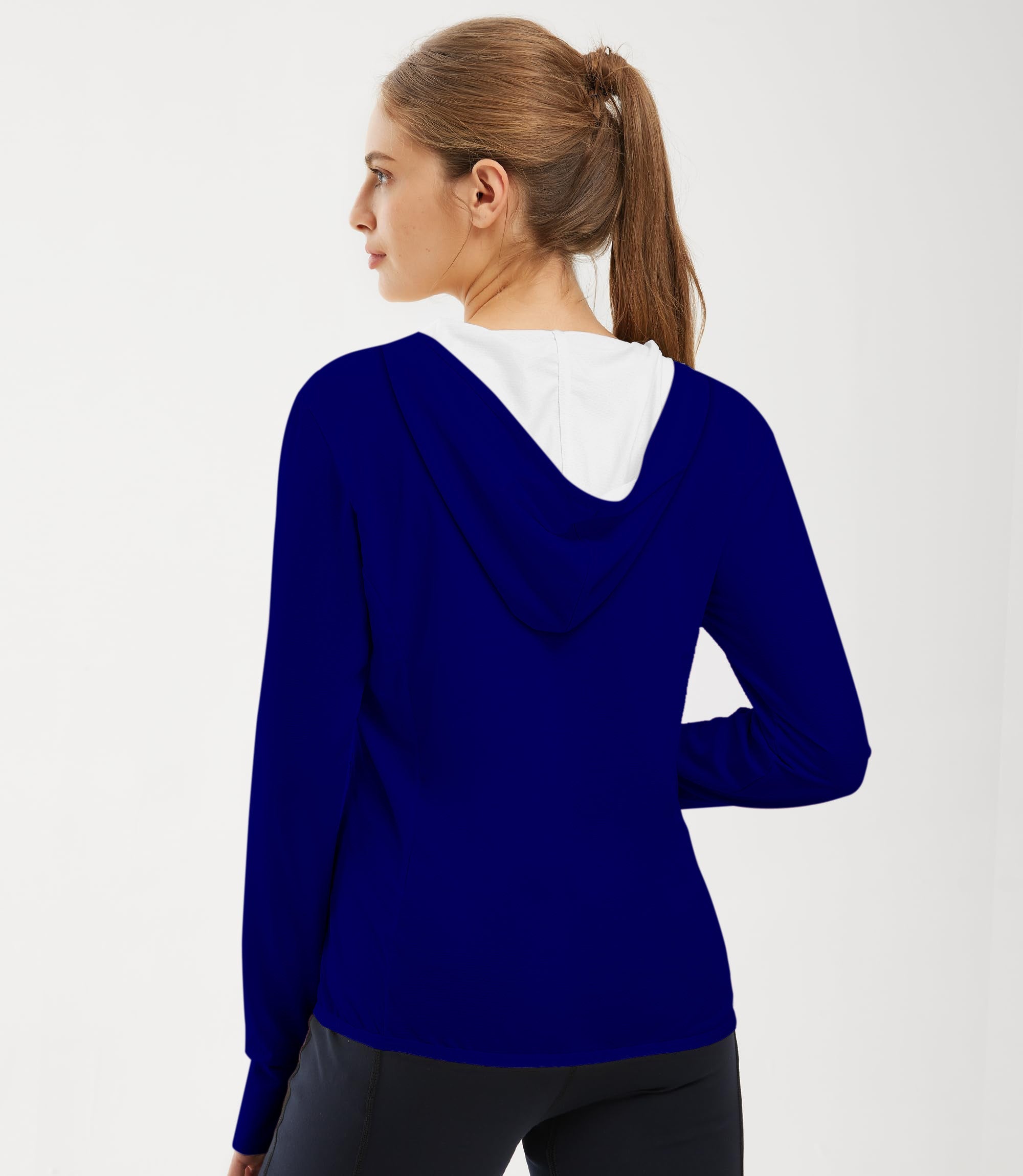 Woman wearing navy women's outdoor hoodies with slim fit and zip hood design