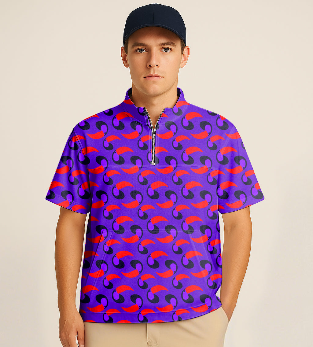 Man wearing purple and red patterned half zipper turtleneck golf short shirt with toucan embroidery