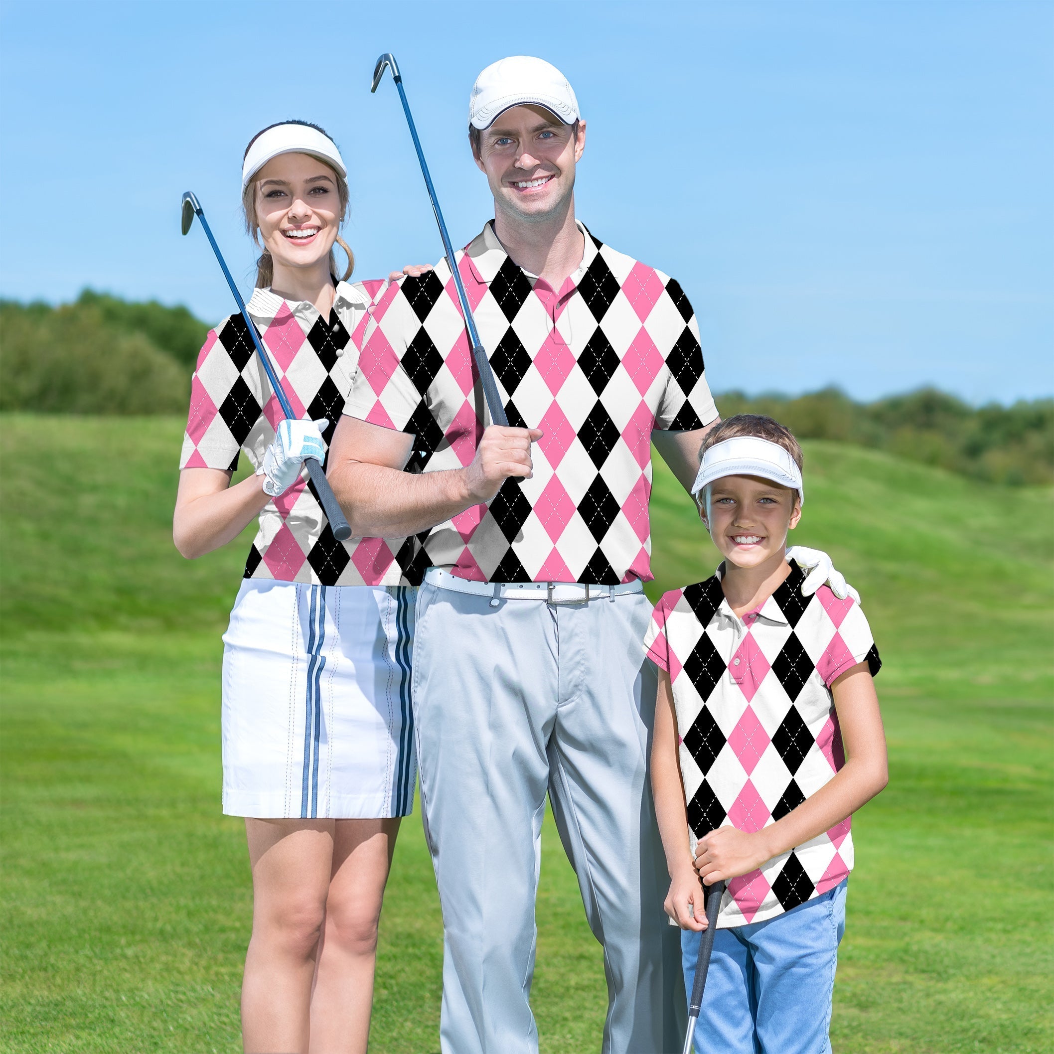 family wearing pink black argyle golf shirts on golf course