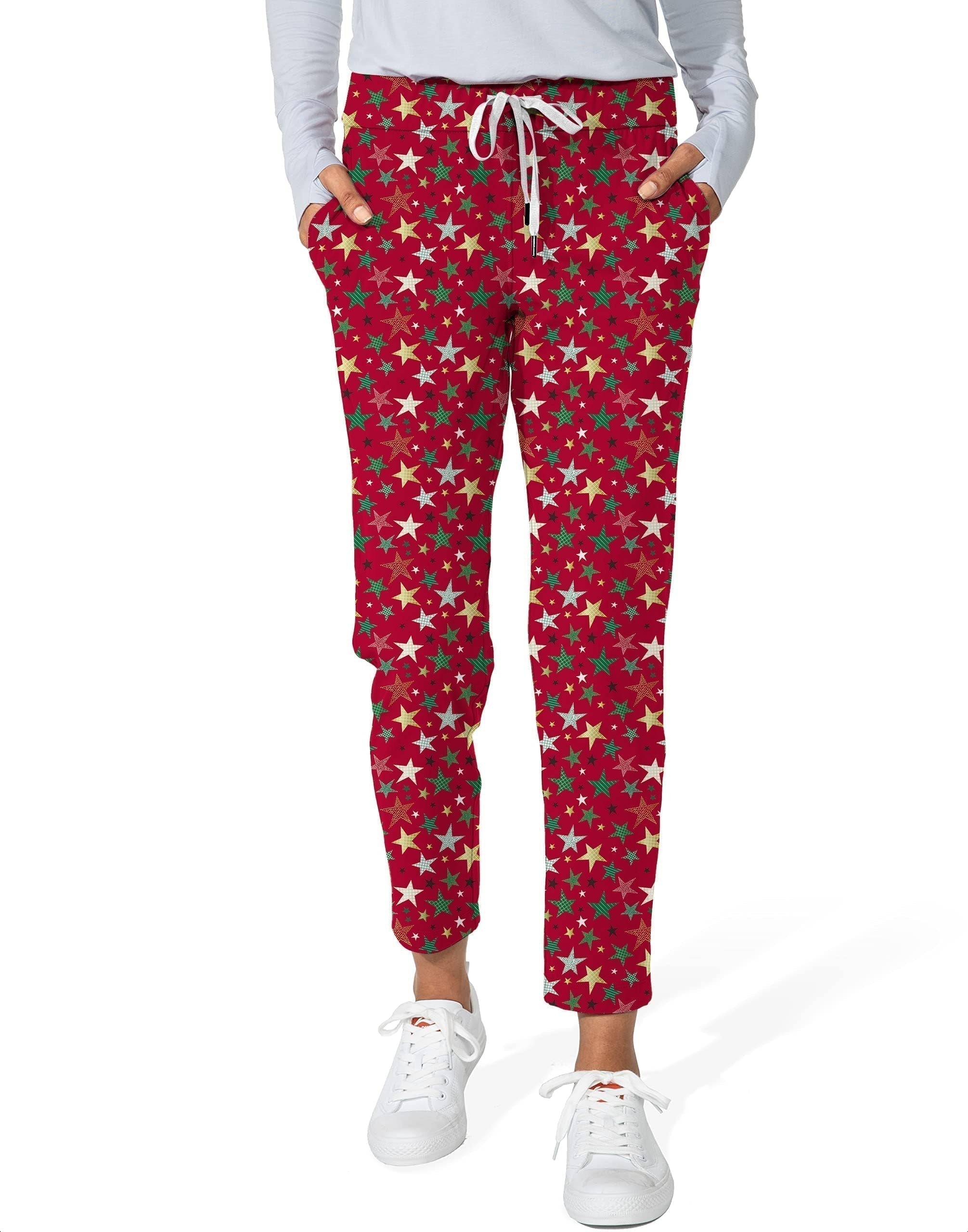 Colorful Stars Christmas women's 7/8 stretch ankle golf pants with nylon spandex fabric, elastic waistband, side pockets, and festive star pattern