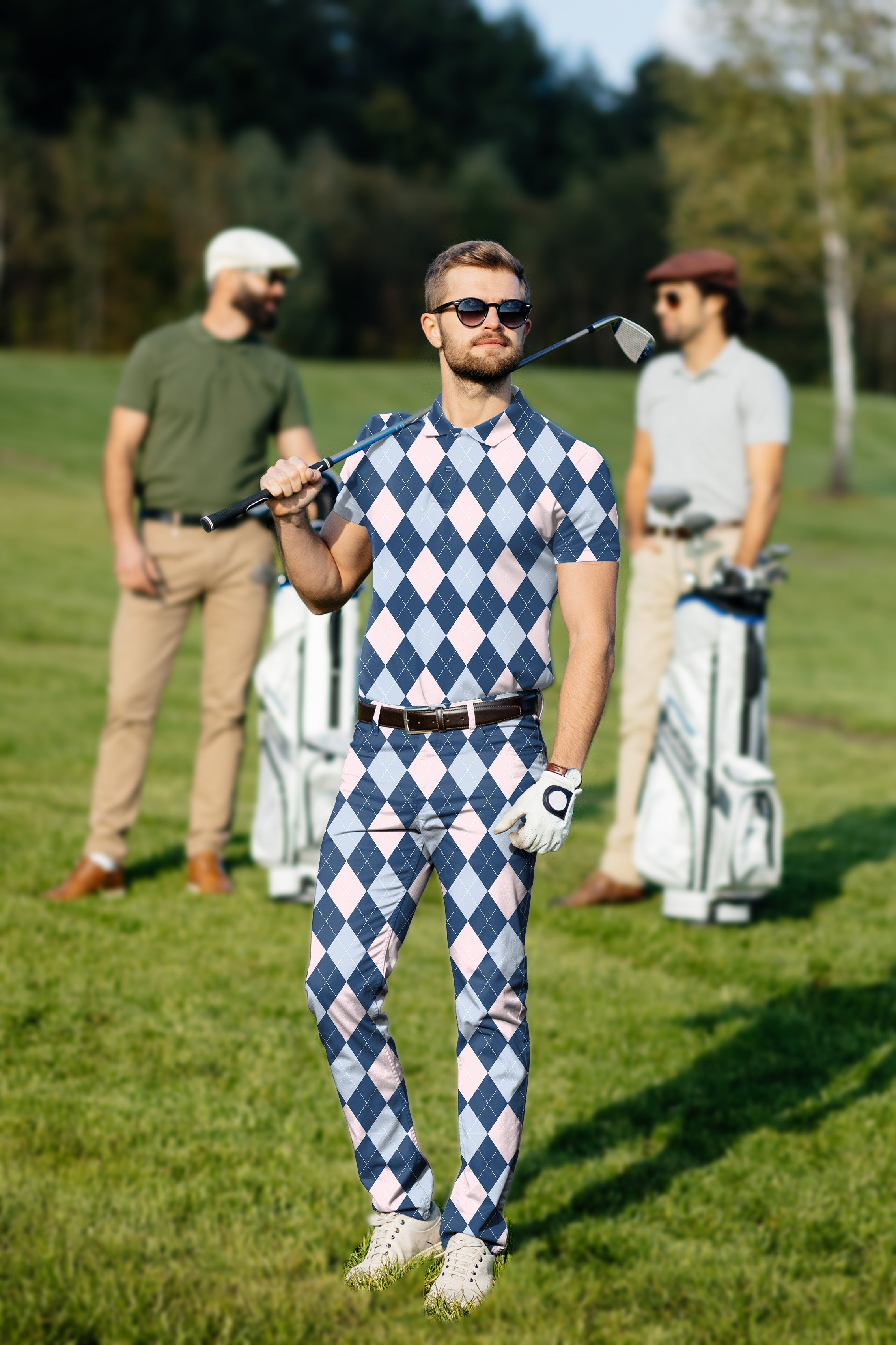 Men's golf set with blue argyle polo and pants, tailored fit, stretch fabric, moisture-wicking, wrinkle-resistant, and UPF 40+ protection