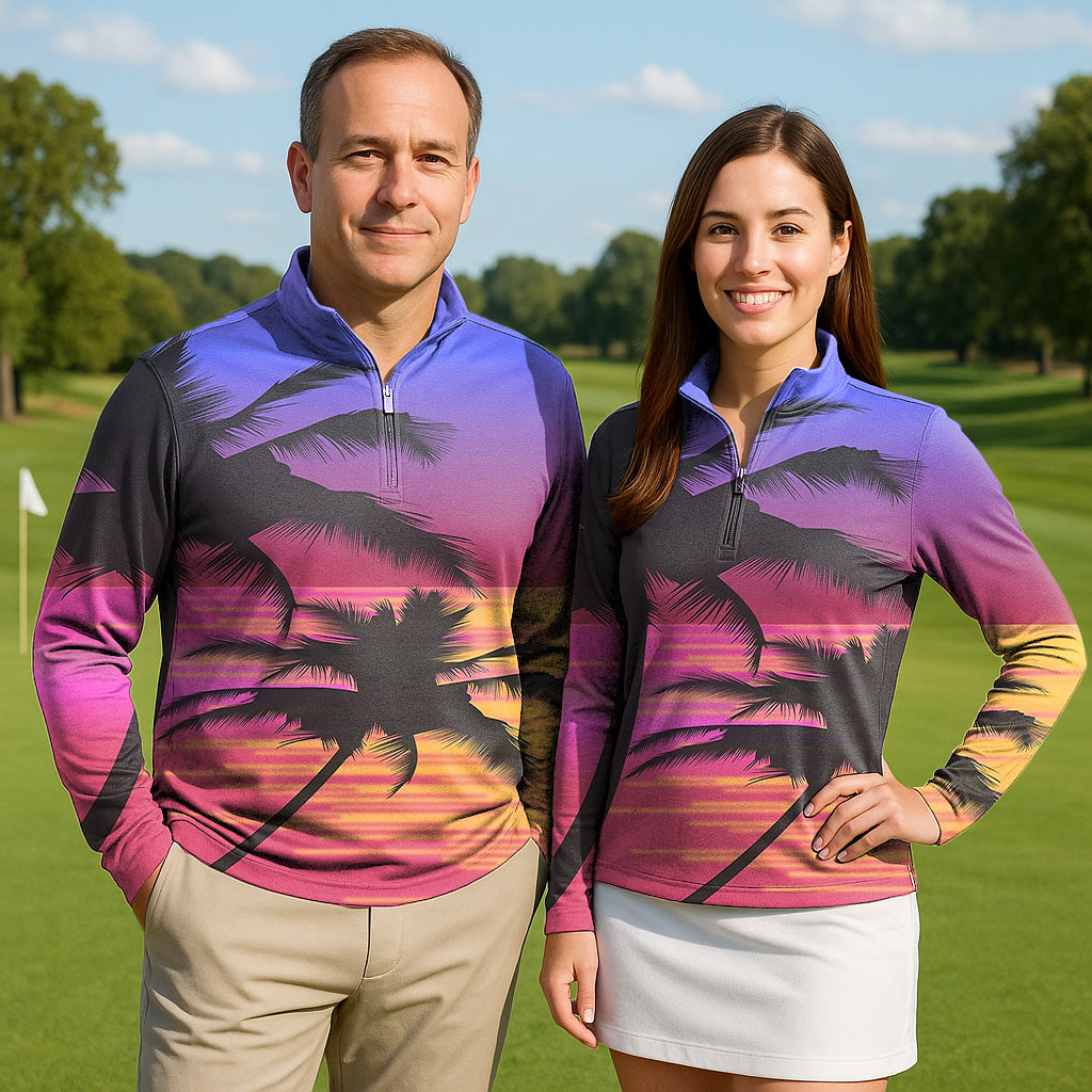 Couple wearing Red Sunset Palm Tree 3/4 zip golf tops with long sleeves outdoors on golf course