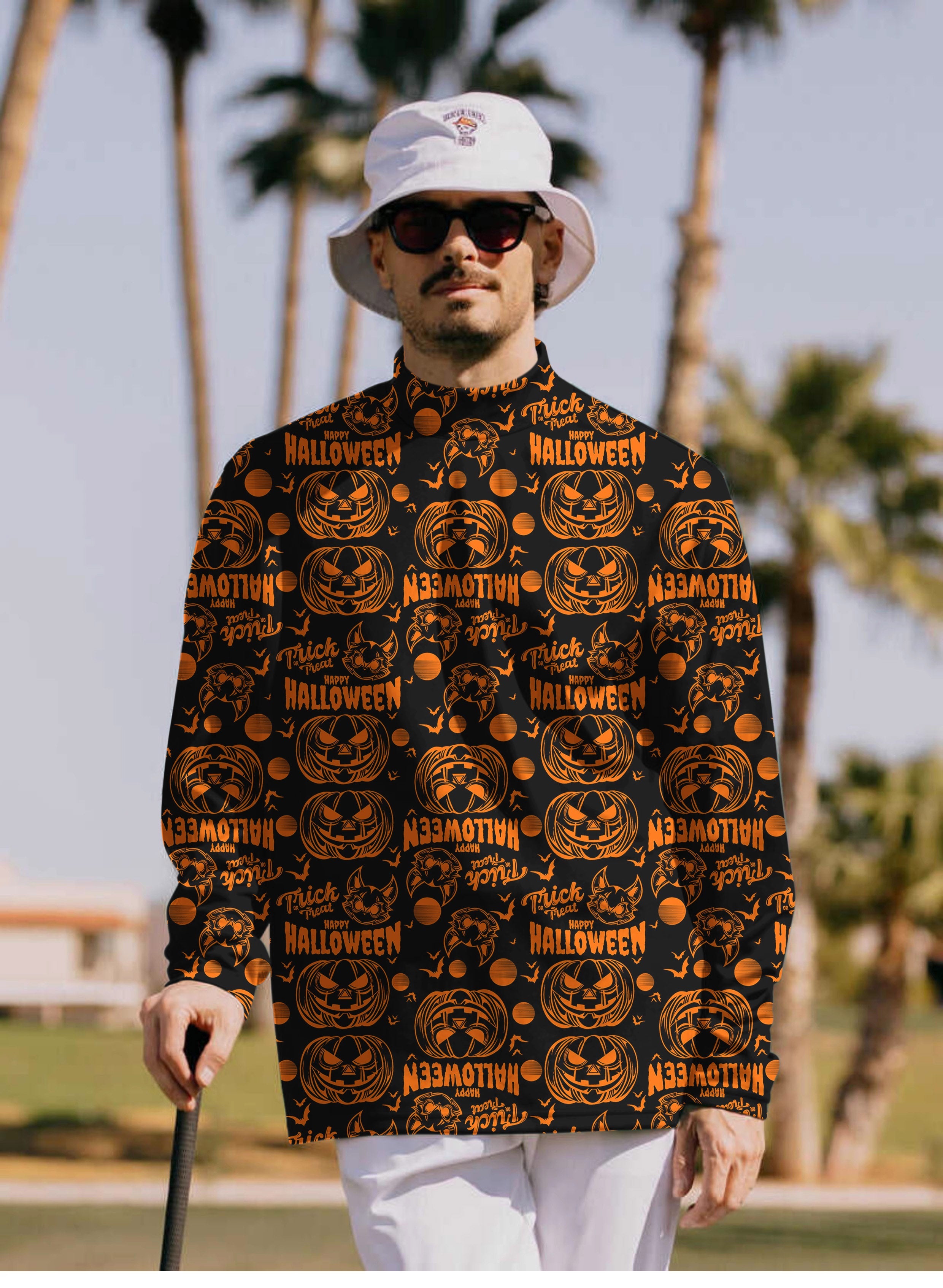 Men's Happy Halloween Pumpkin Pullover high neck long sleeve T-shirt with Halloween pumpkin print worn by man outdoors