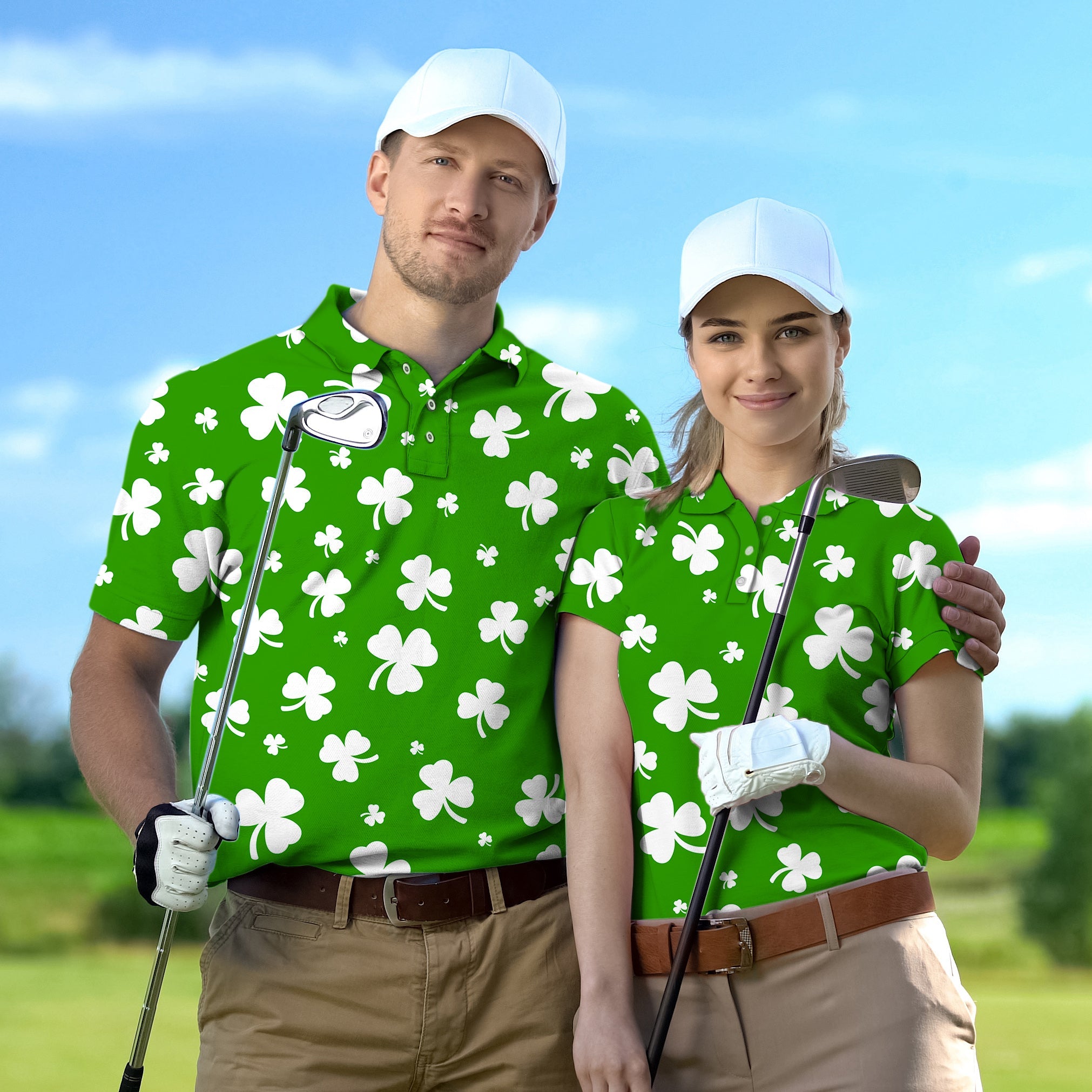 Couple wearing green leaf clover patterned golf shirts holding golf clubs on course
