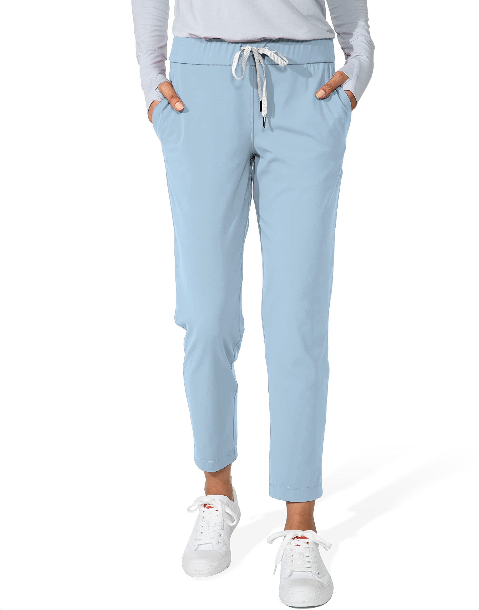 Women's 7/8 stretch ankle golf pants in light blue with drawstring waist and side pockets