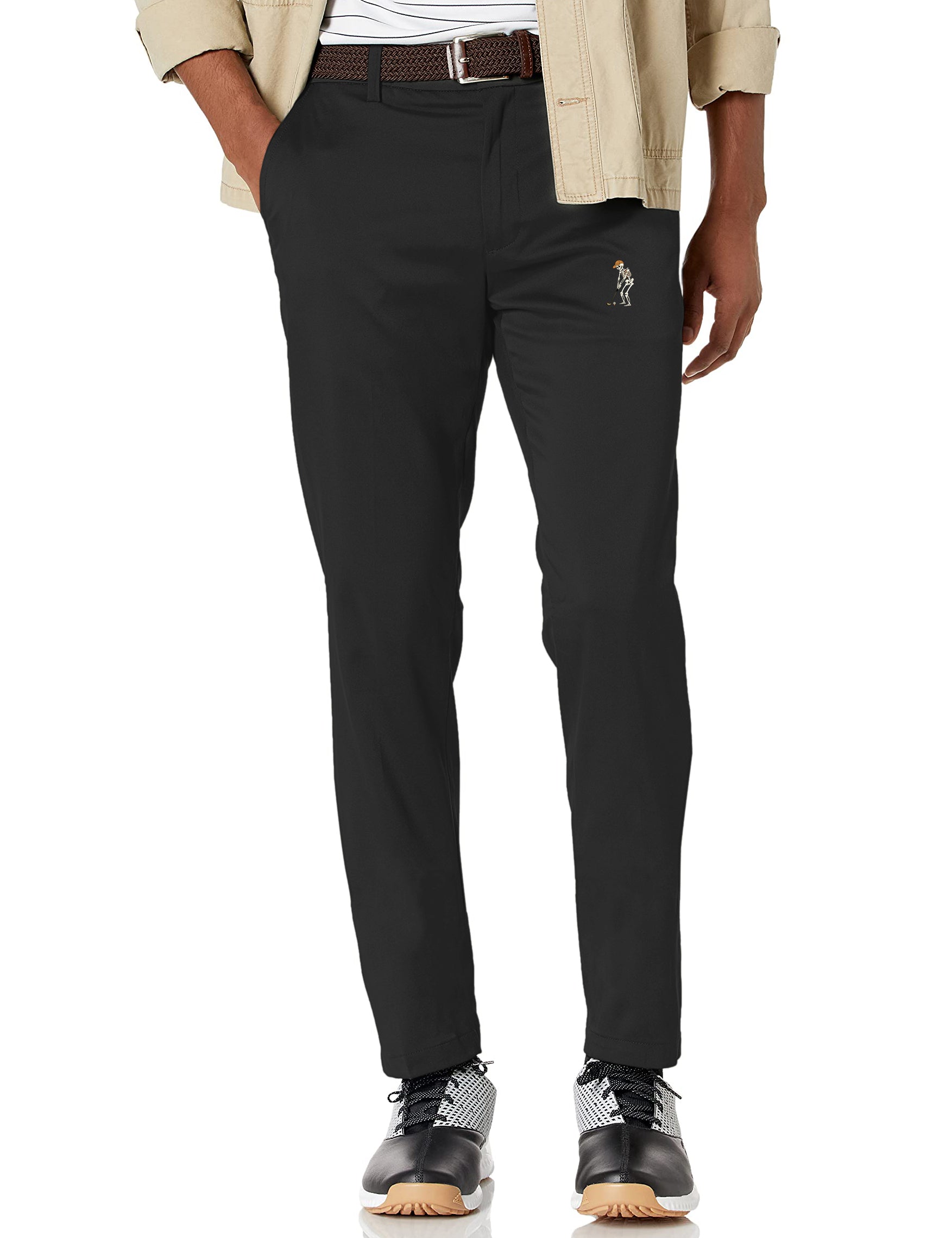 Men's black Halloween skeleton golf pants with pumpkin design, lightweight, stretch, moisture-wicking fabric.
