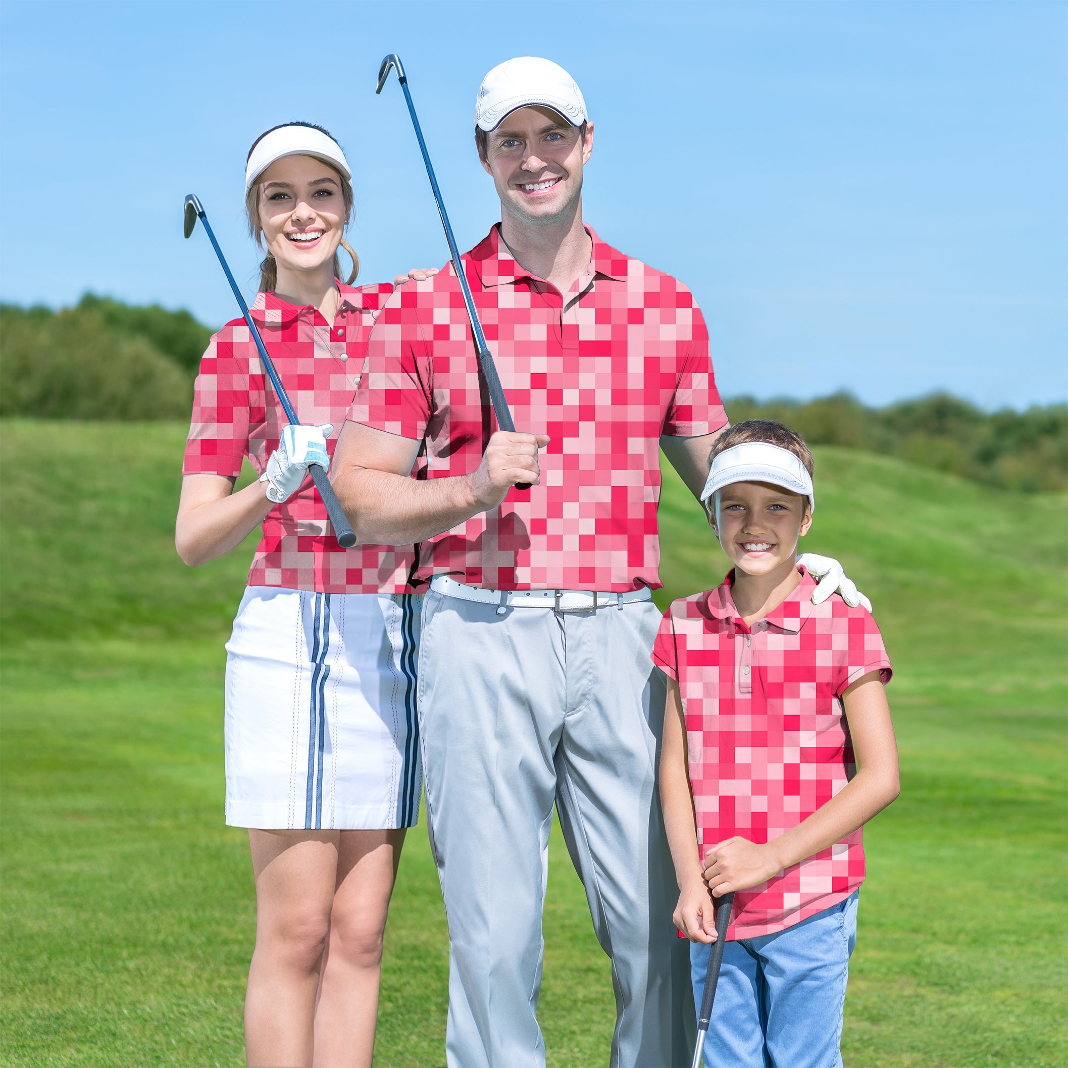 Family wearing matching light red pixel pattern golf shirts on course holding clubs
