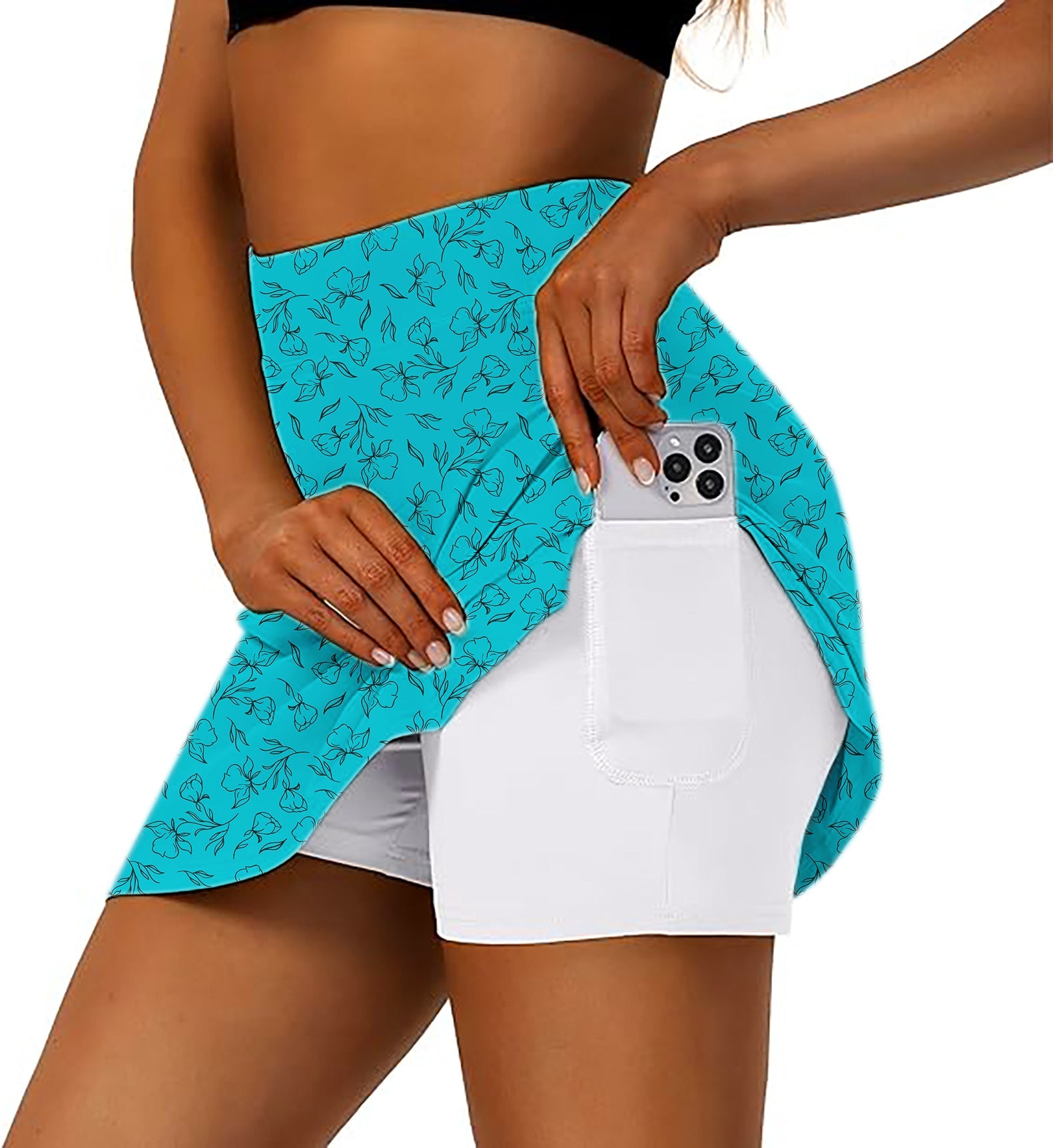 Women's teal floral golf skirt with inner shorts and phone pocket