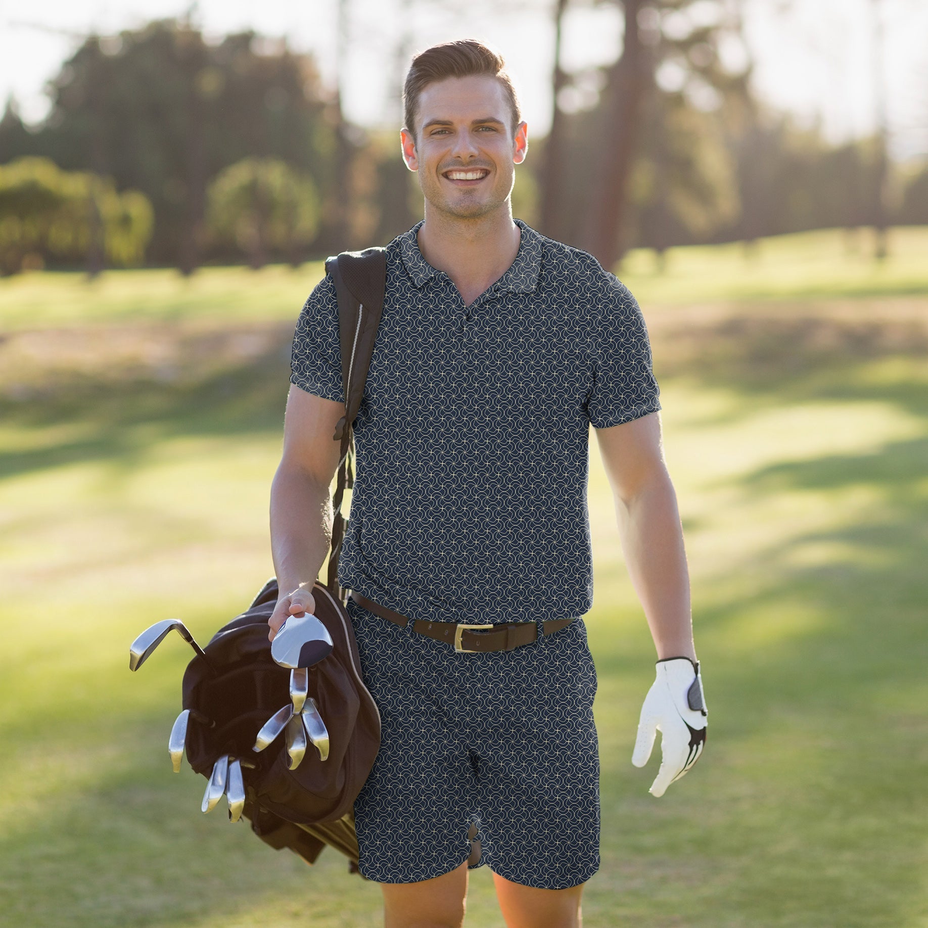 Men's golf set polo and shorts in navy blue floral pattern with four-way stretch, moisture-wicking fabric, wrinkle resistant, and UPF 40+ protection.